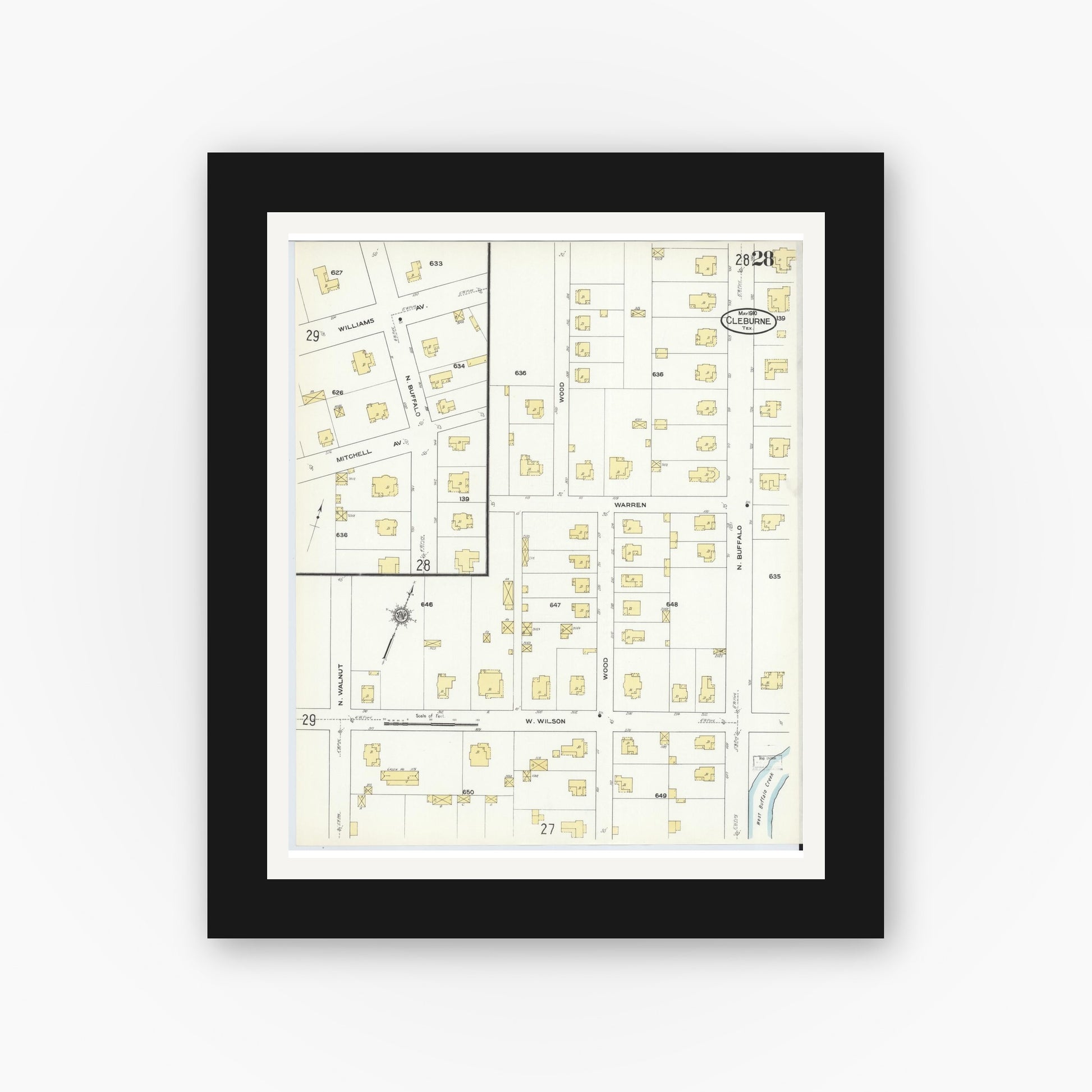 Old map wall art mockup — black gallery frame with white mat — Sanborn Fire Insurance Map from Cleburne, Johnson County, Texas (1910), Sheet #0028