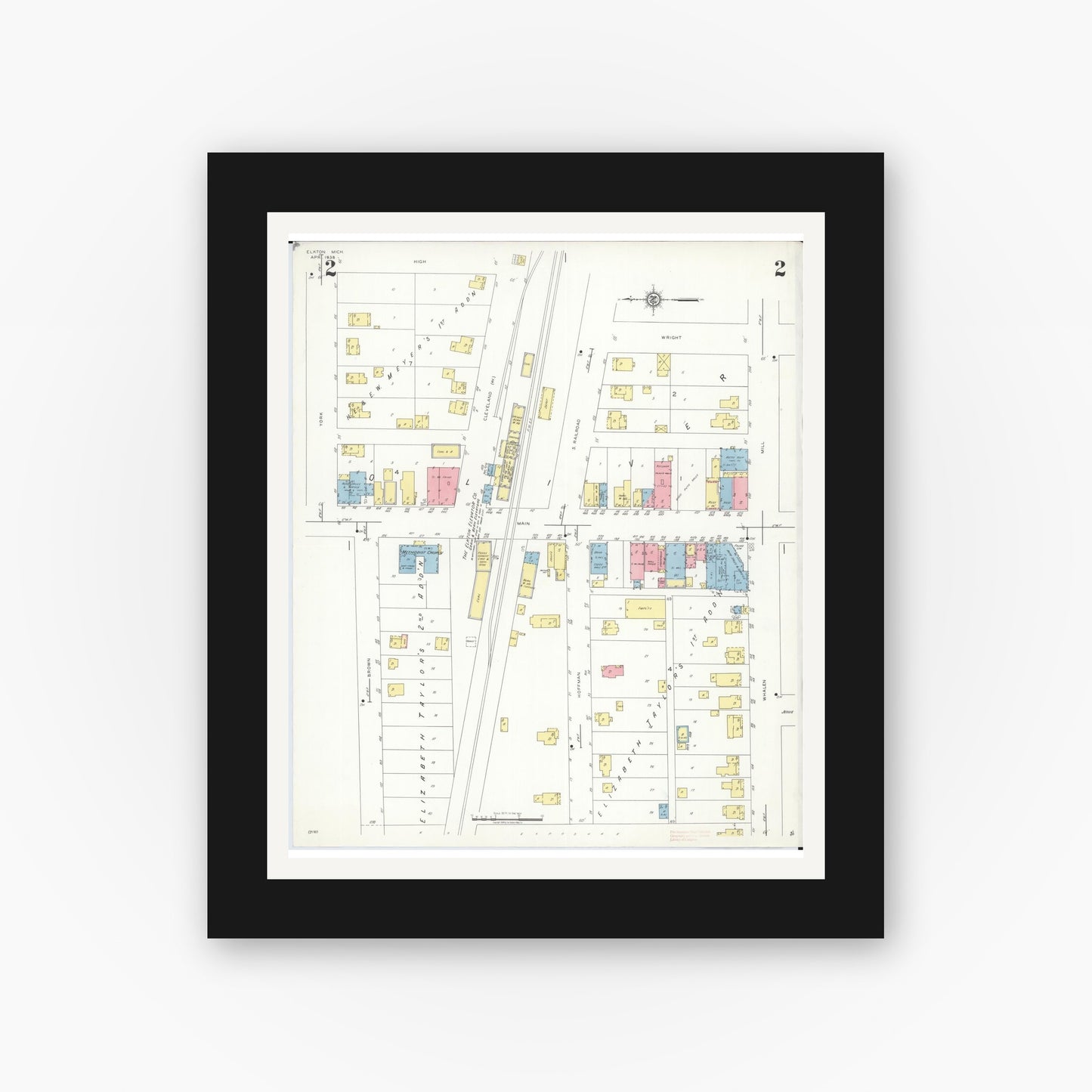 Old map wall art mockup — black gallery frame with white mat — Sanborn Fire Insurance Map from Elkton, Huron County, Michigan (1938), Sheet #0002
