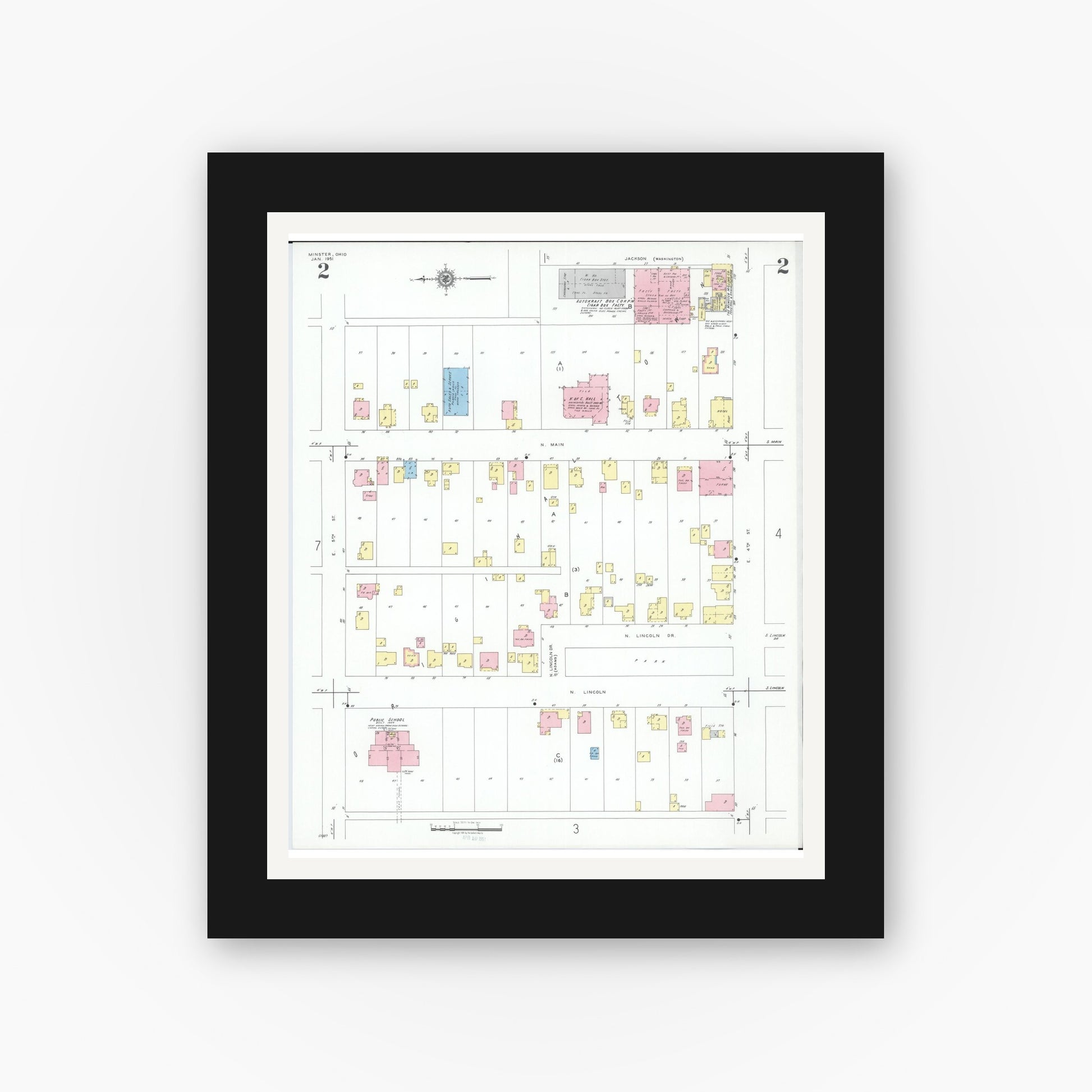 Old map wall art mockup — black gallery frame with white mat — Sanborn Fire Insurance Map from Minster, Auglaize County, Ohio (1951), Sheet #0002