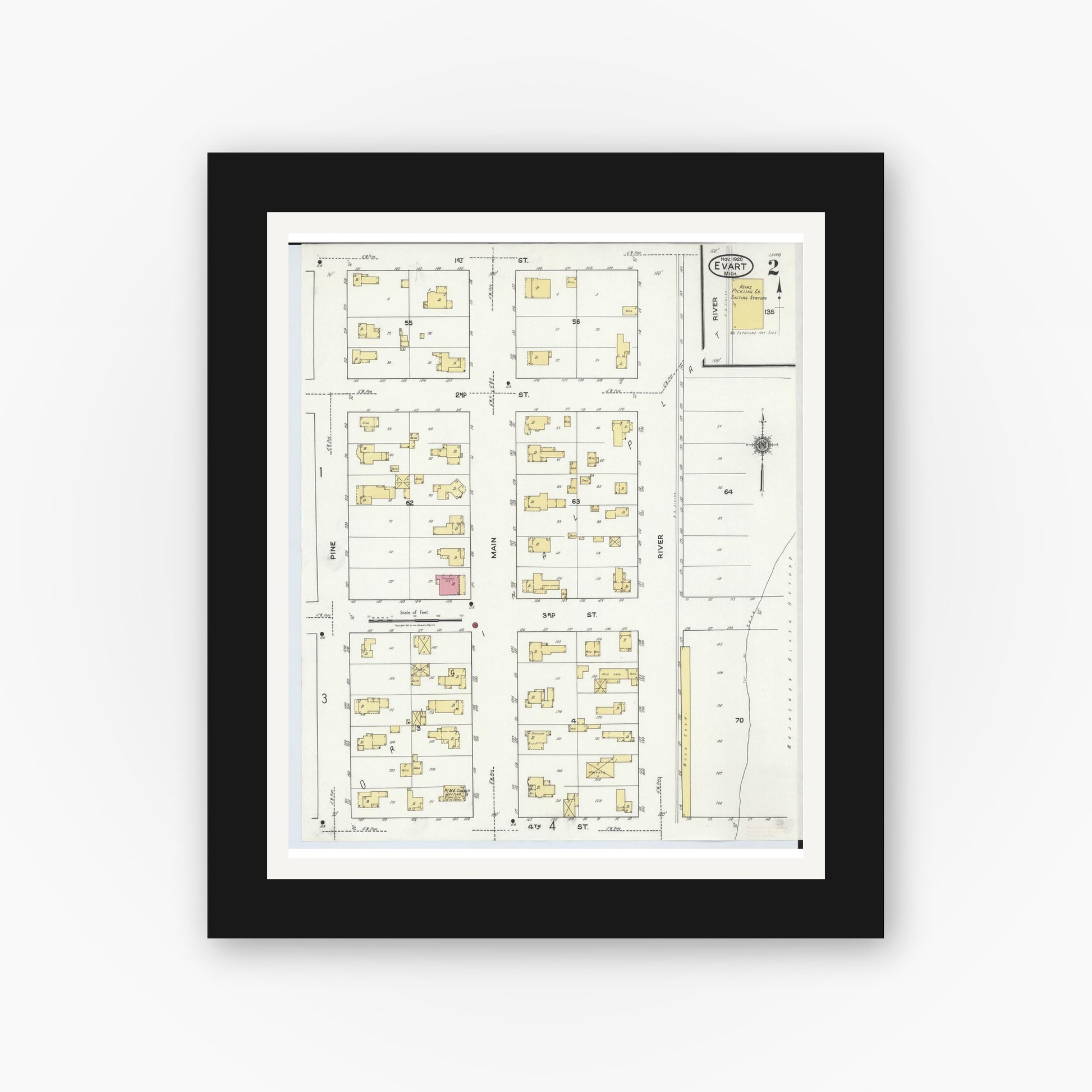 Old map wall art mockup — black gallery frame with white mat — Sanborn Fire Insurance Map from Evart, Osceola County, Michigan (1920), Sheet #0002