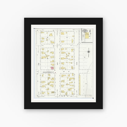 Old map wall art mockup — black gallery frame with white mat — Sanborn Fire Insurance Map from Evart, Osceola County, Michigan (1920), Sheet #0002