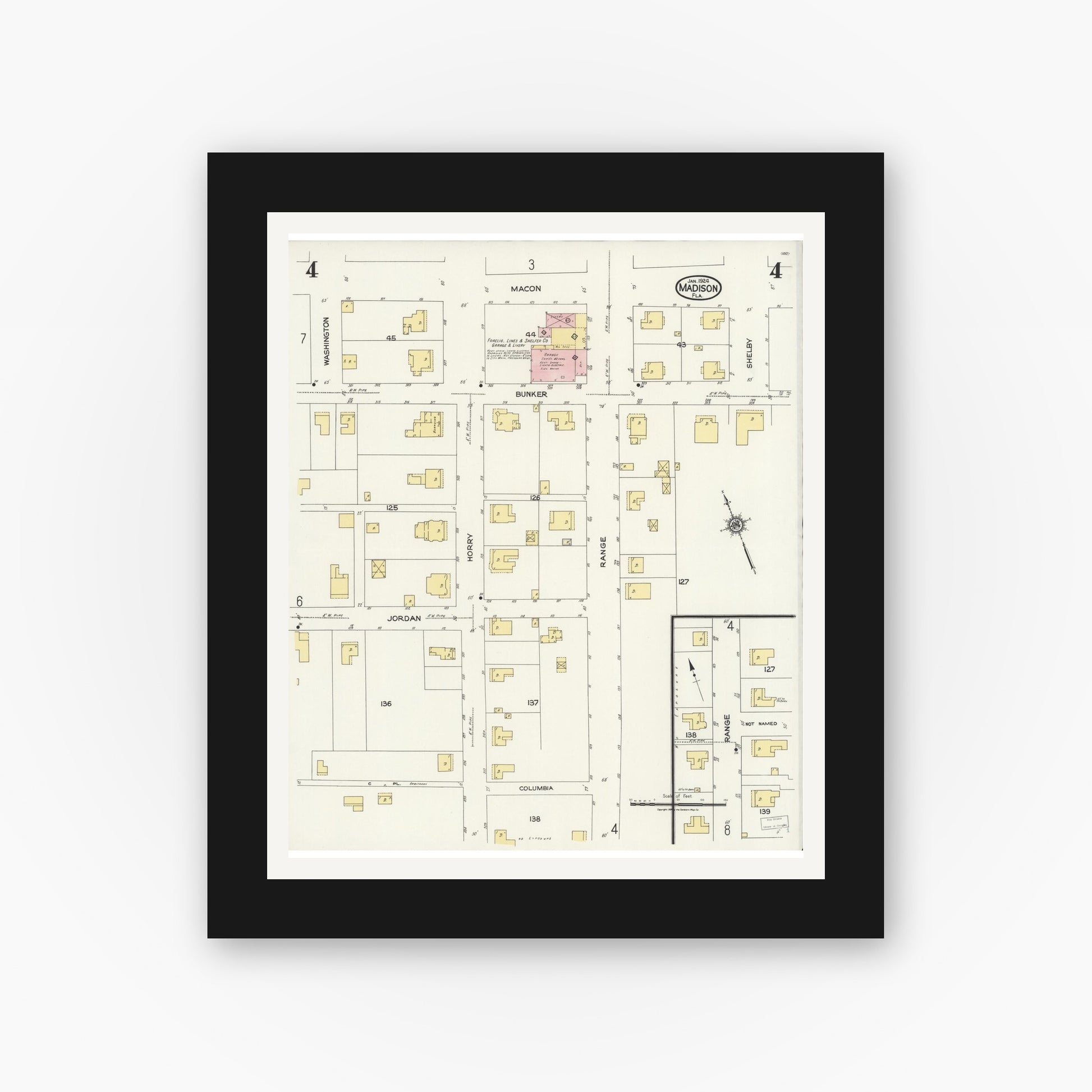 Old map wall art mockup — black gallery frame with white mat — Sanborn Fire Insurance Map from Madison, Madison County, Florida (1924), Sheet #0004