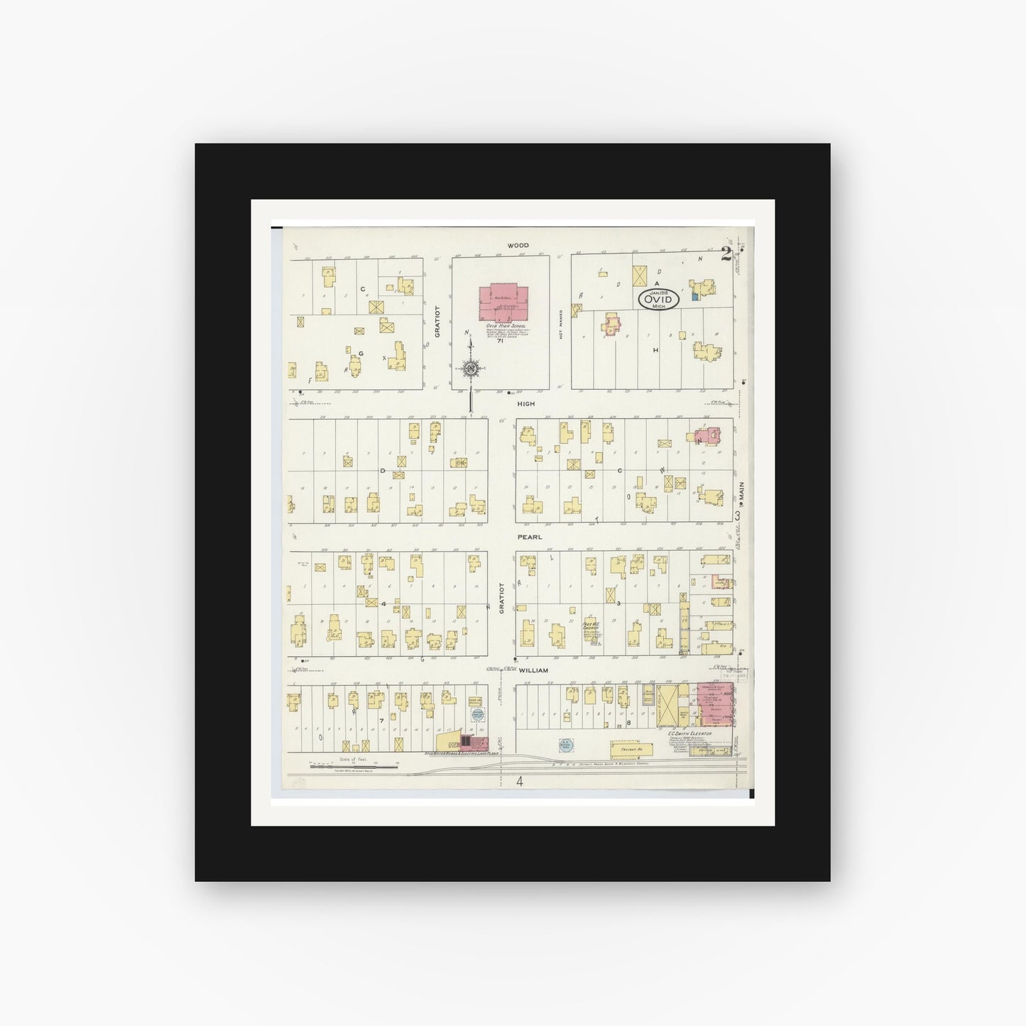 Old map wall art mockup — black gallery frame with white mat — Sanborn Fire Insurance Map from Ovid, Clinton County, Michigan (1918), Sheet #0002