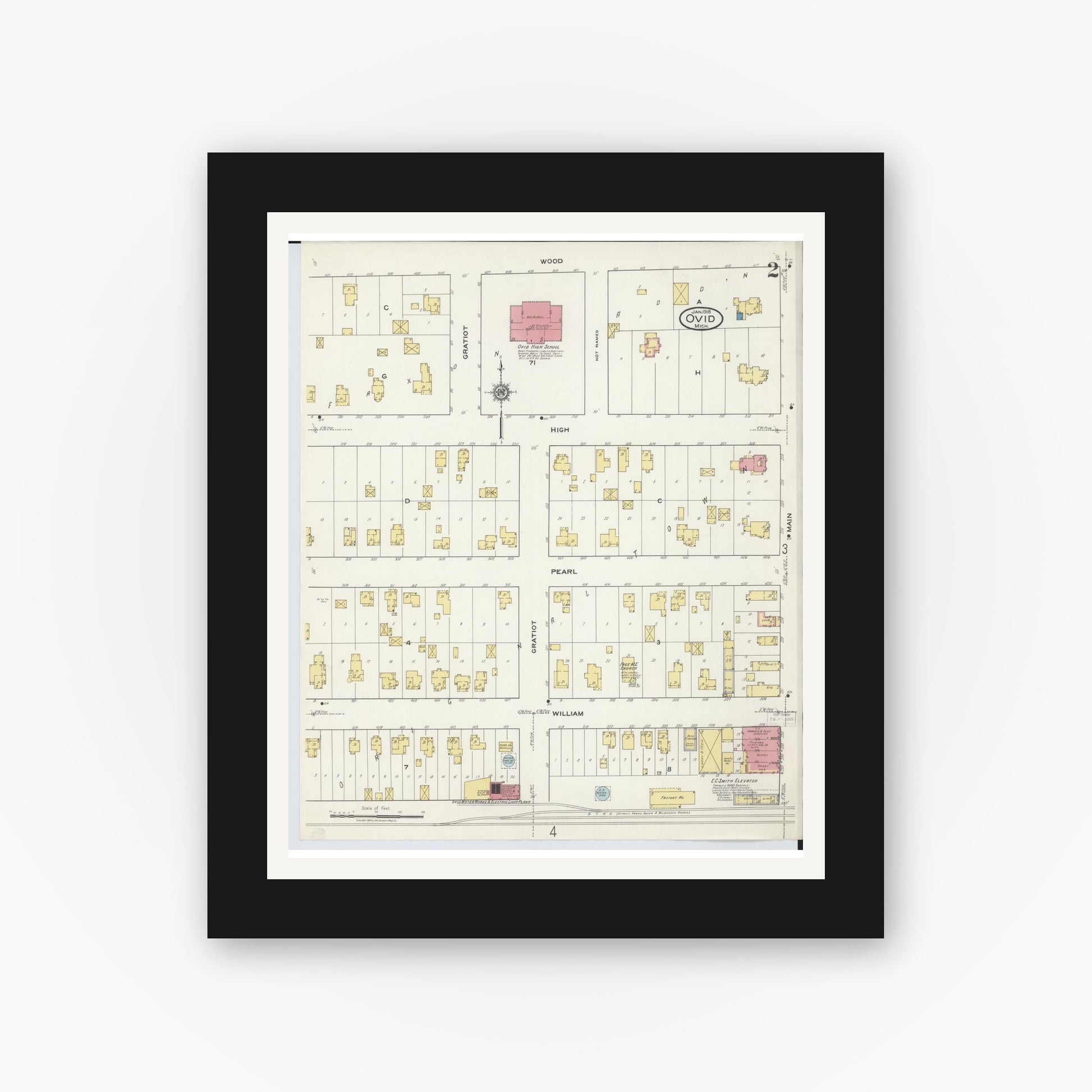 Old map wall art mockup — black gallery frame with white mat — Sanborn Fire Insurance Map from Ovid, Clinton County, Michigan (1918), Sheet #0002