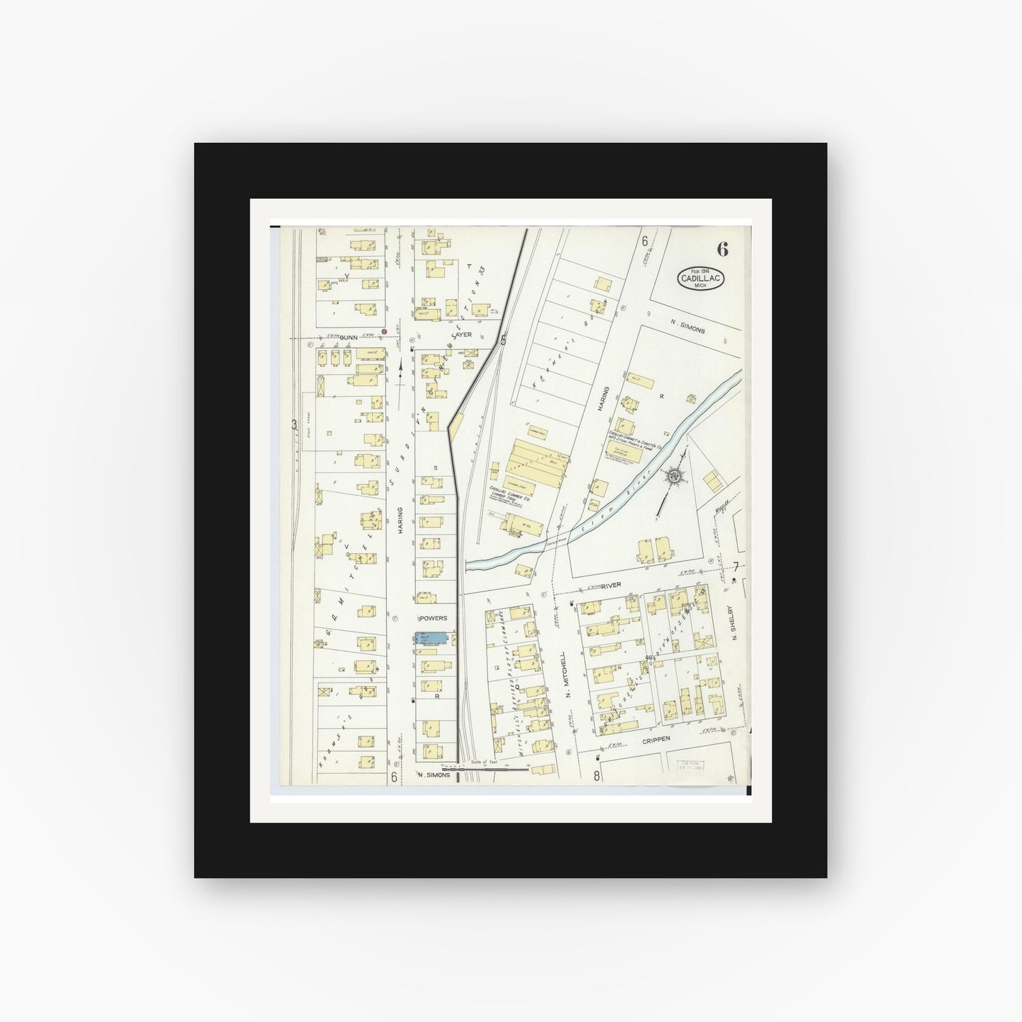 Old map wall art mockup — black gallery frame with white mat — Sanborn Fire Insurance Map from Cadillac, Wexford County, Michigan (1914), Sheet #0006