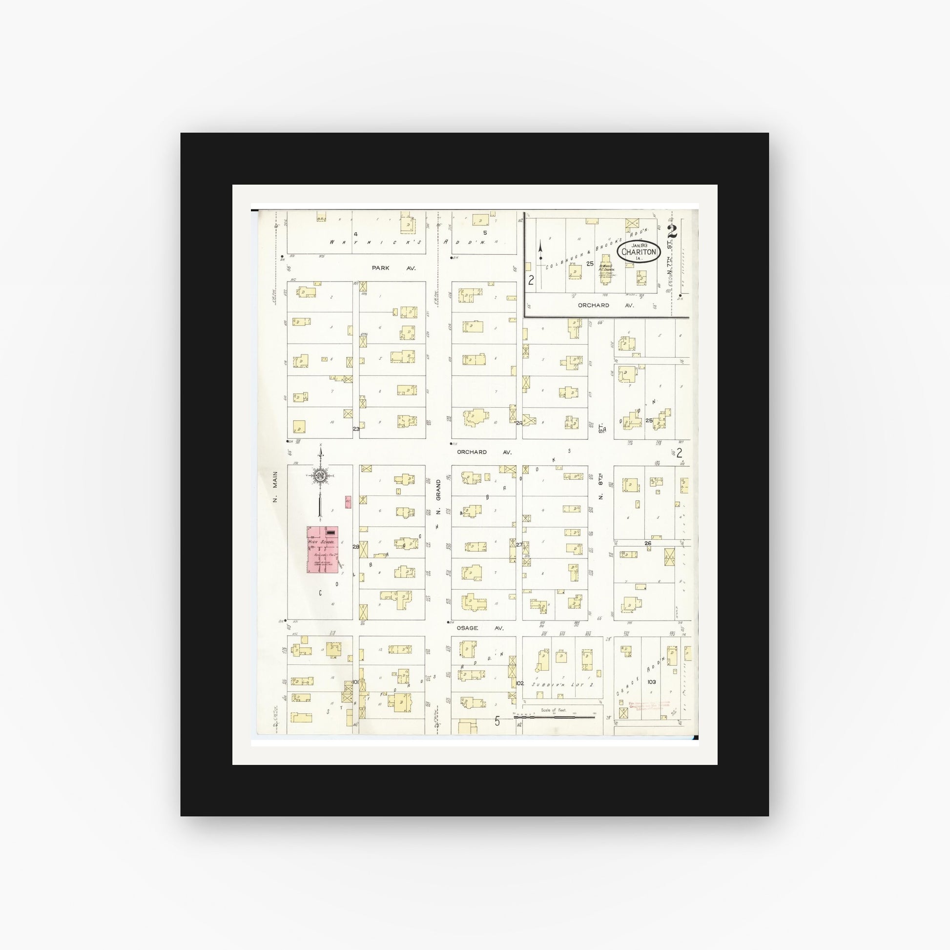 Old map wall art mockup — black gallery frame with white mat — Sanborn Fire Insurance Map from Chariton, Lucas County, Iowa (1913), Sheet #0002