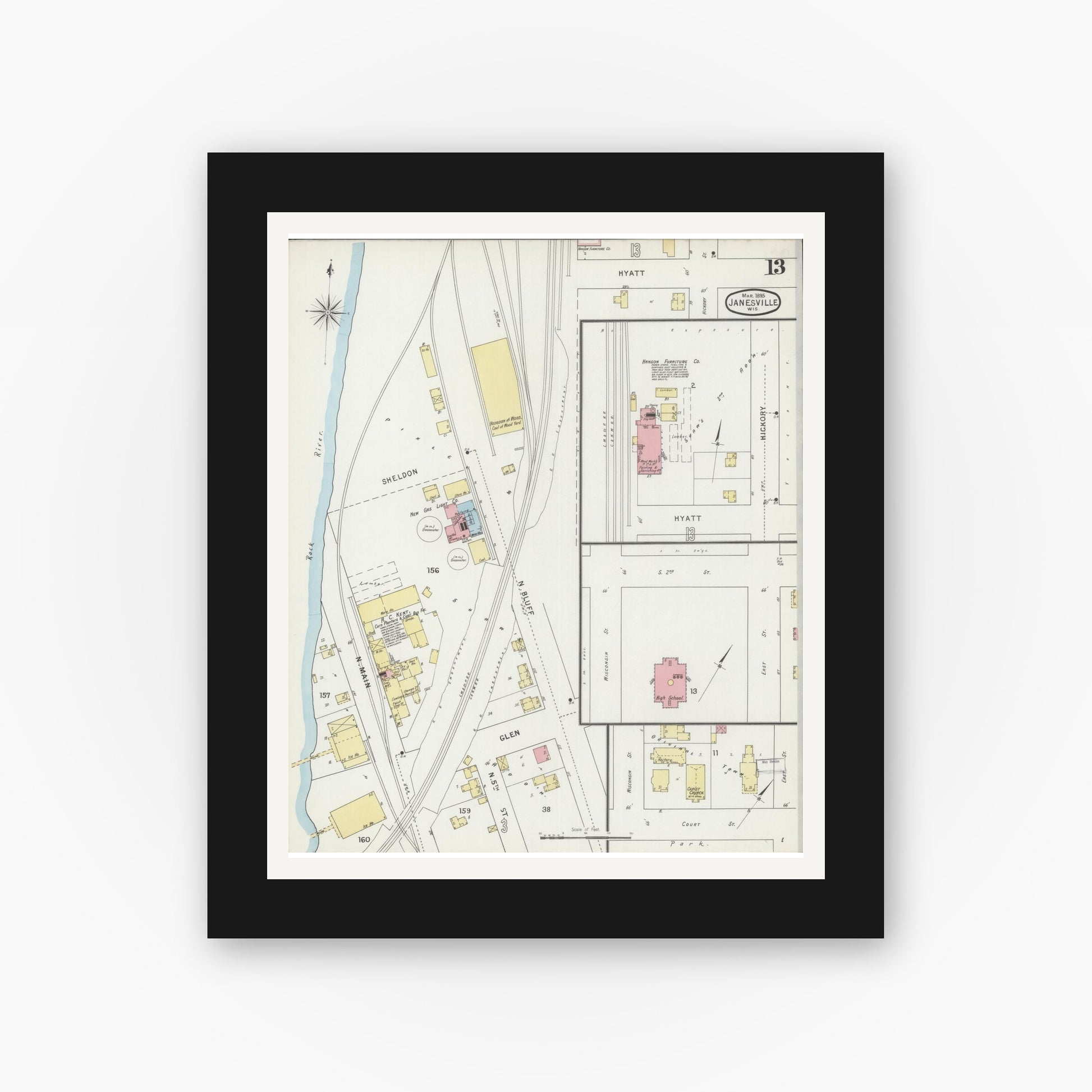 Old map wall art mockup — black gallery frame with white mat — Sanborn Fire Insurance Map from Janesville, Rock County, Wisconsin (1895), Sheet #0013