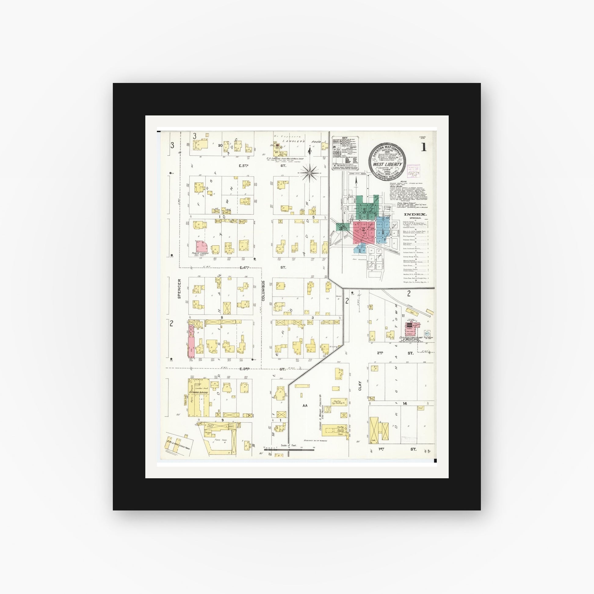 Old map wall art mockup — black gallery frame with white mat — Sanborn Fire Insurance Map from West Liberty, Muscatine County, Iowa (1906) â€” Complete Set