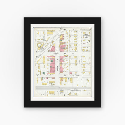 Old map wall art mockup — black gallery frame with white mat — Sanborn Fire Insurance Map from Gibson City, Ford County, Illinois (1900), Sheet #0002