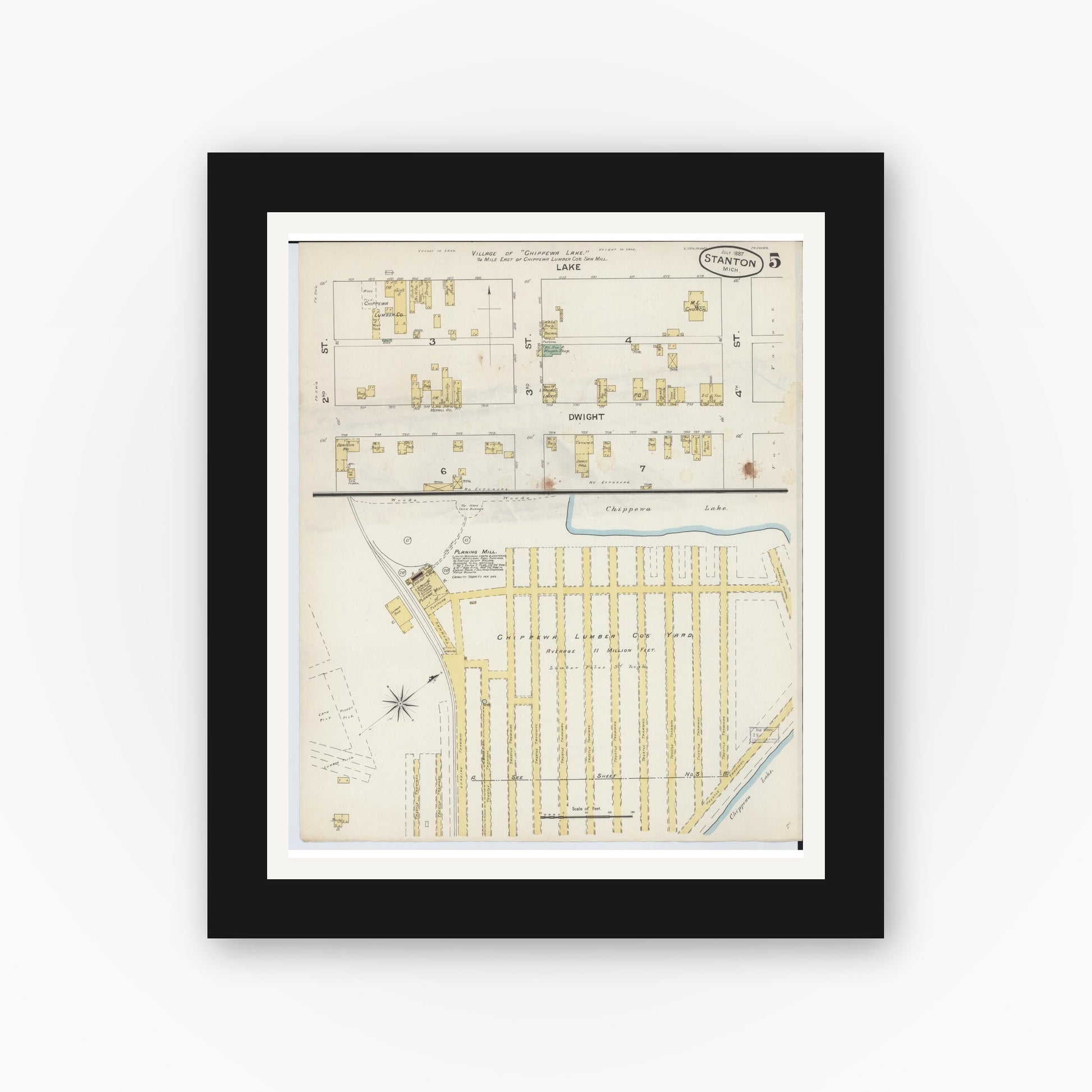 Old map wall art mockup — black gallery frame with white mat — Sanborn Fire Insurance Map from Stanton, Montcalm County, Michigan (1887), Sheet #0005