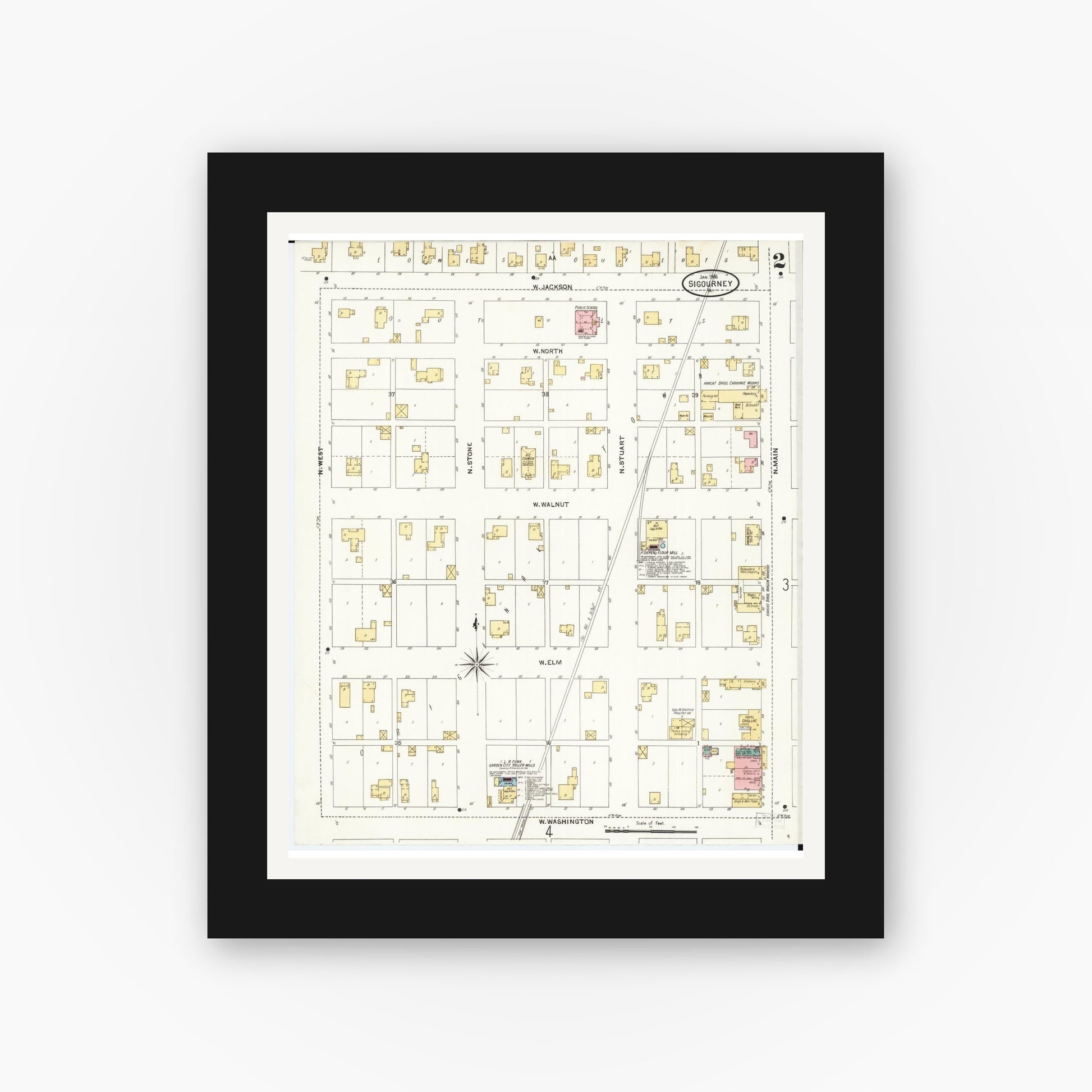 Old map wall art mockup — black gallery frame with white mat — Sanborn Fire Insurance Map from Sigourney, Kiokuk County, Iowa (1906), Sheet #0002