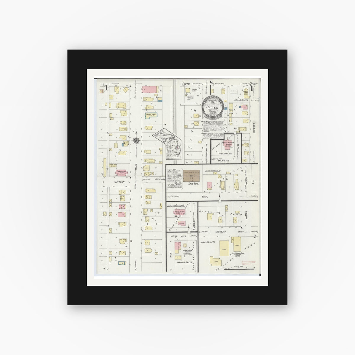 Old map wall art mockup — black gallery frame with white mat — Sanborn Fire Insurance Map from Pigeon, Huron County, Michigan (1924), Sheet #0001