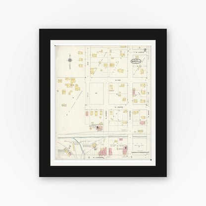 Old map wall art mockup — black gallery frame with white mat — Sanborn Fire Insurance Map from Monticello, Piatt County, Illinois (1915), Sheet #0002