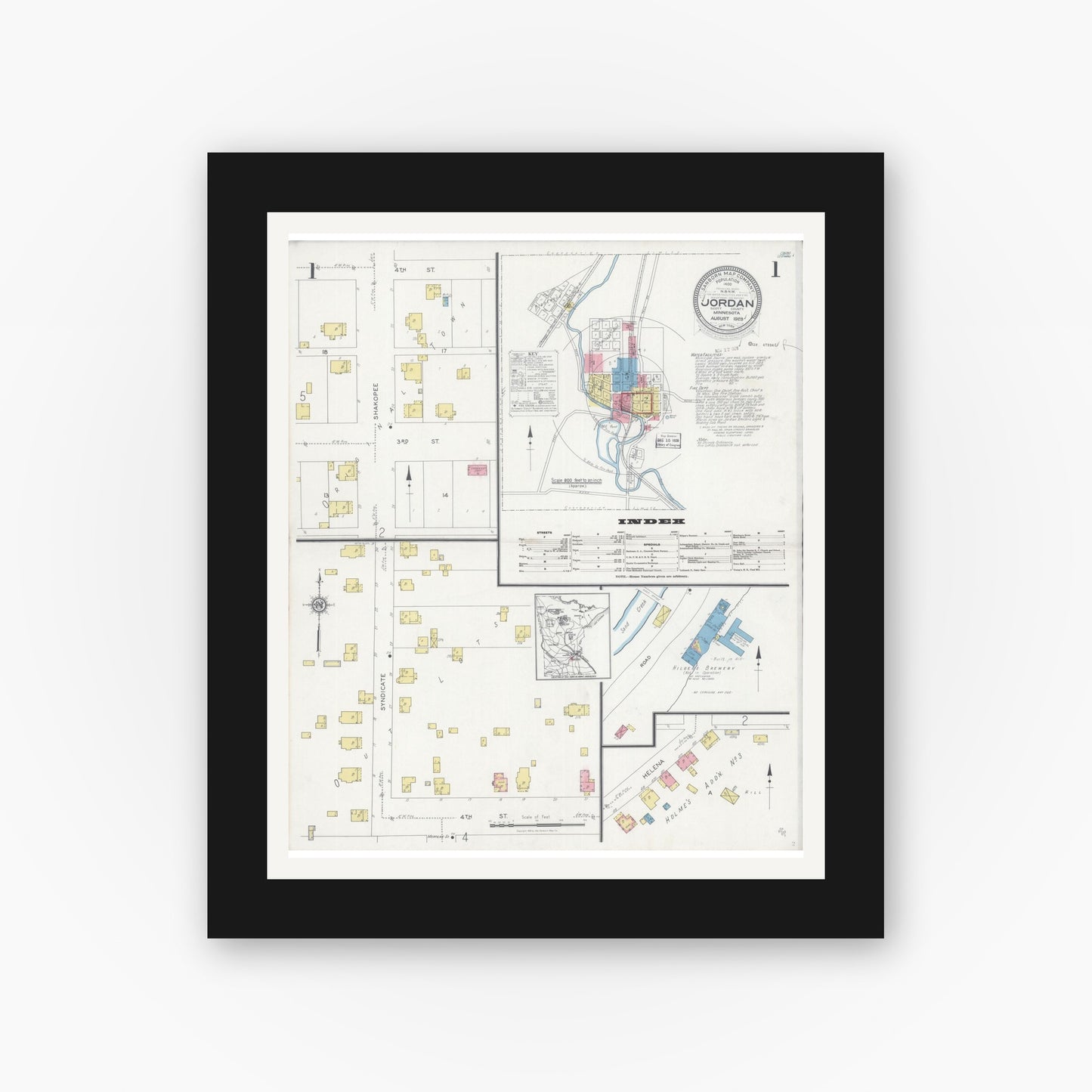 Old map wall art mockup — black gallery frame with white mat — Sanborn Fire Insurance Map from Jordan, Scott County, Minnesota (1928), Sheet #0001