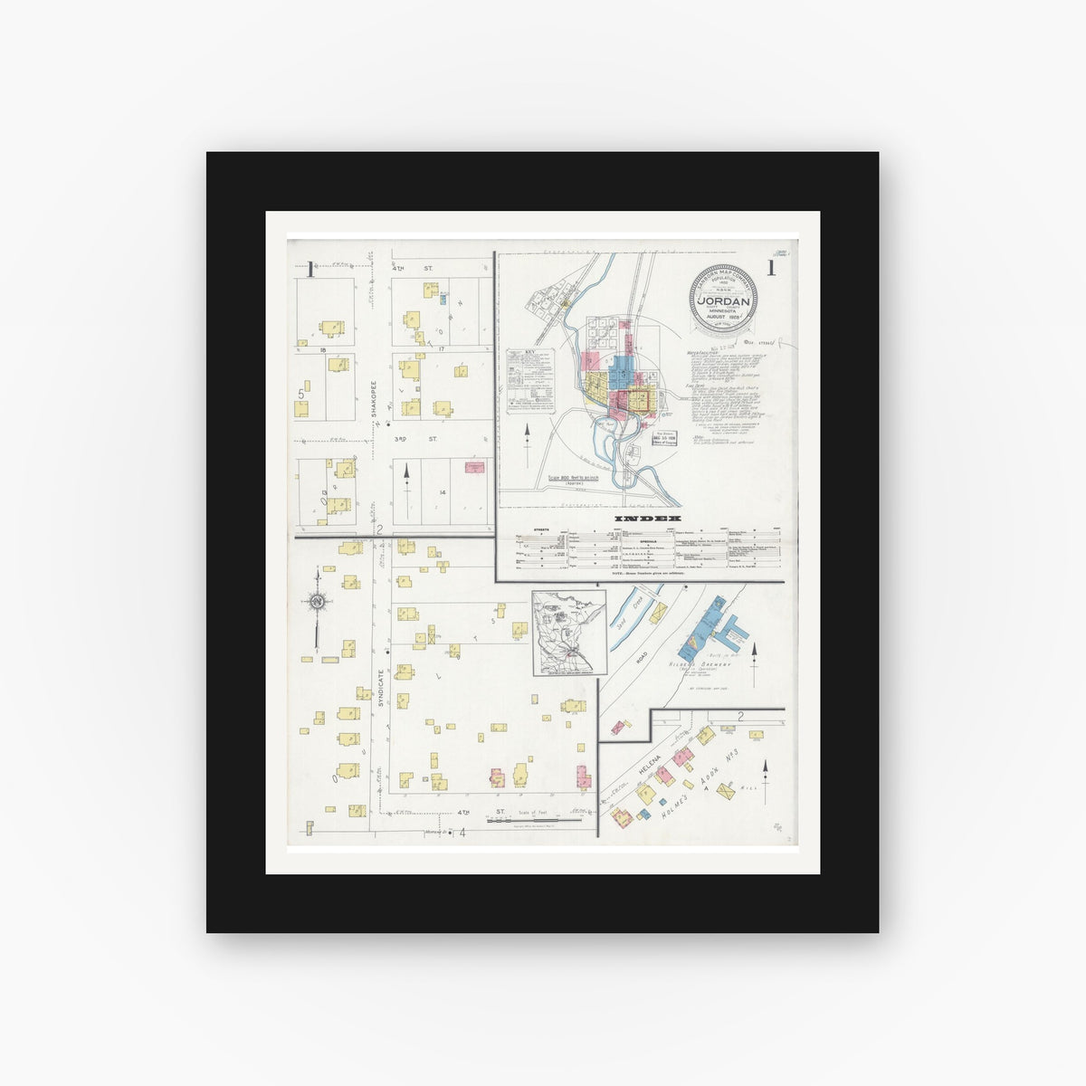Old map wall art mockup — black gallery frame with white mat — Sanborn Fire Insurance Map from Jordan, Scott County, Minnesota (1928), Sheet #0001