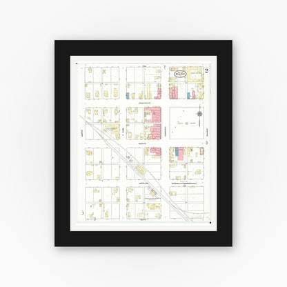 Old map wall art mockup — black gallery frame with white mat — Sanborn Fire Insurance Map from Monroe, Jasper County, Iowa (1911), Sheet #0002