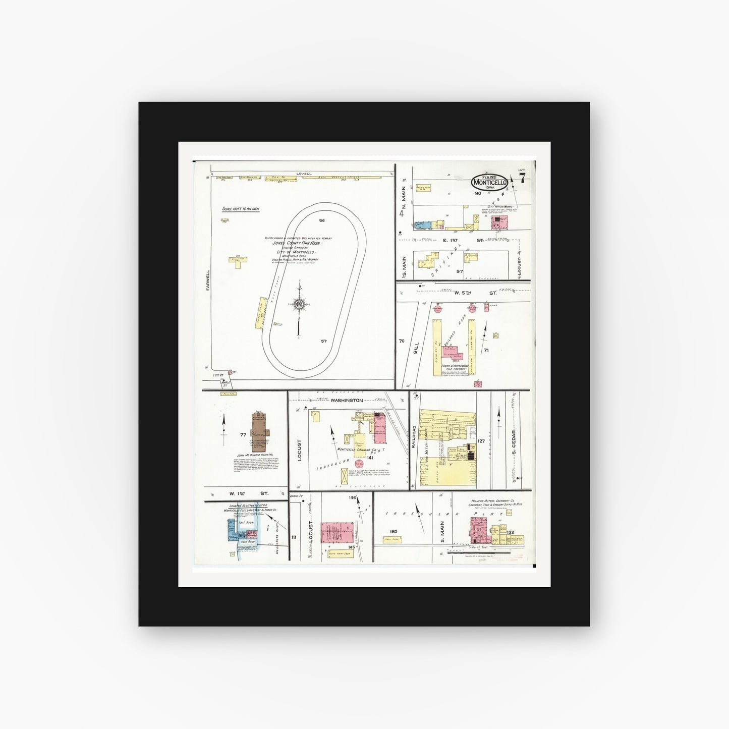 Old map wall art mockup — black gallery frame with white mat — Sanborn Fire Insurance Map from Monticello, Jones County, Iowa (1921), Sheet #0007