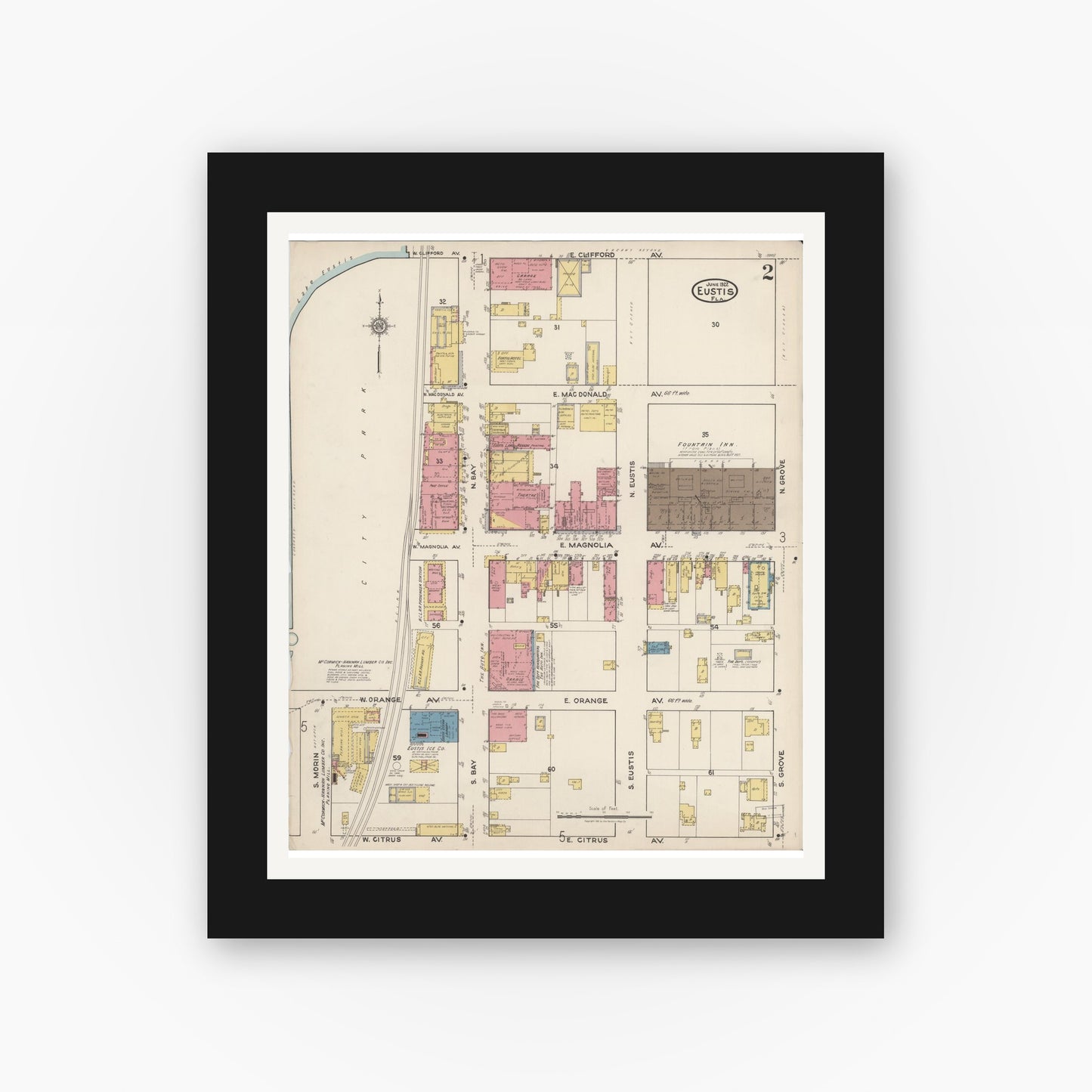 Old map wall art mockup — black gallery frame with white mat — Sanborn Fire Insurance Map from Eustis, Lake County, Florida (1922), Sheet #0002