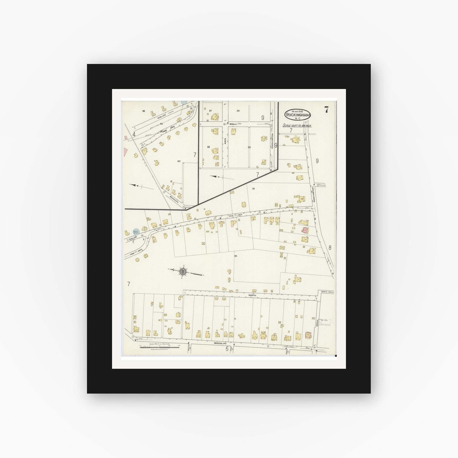 Old map wall art mockup — black gallery frame with white mat — Sanborn Fire Insurance Map from Rockingham, Richmond County, North Carolina (1918), Sheet #0007