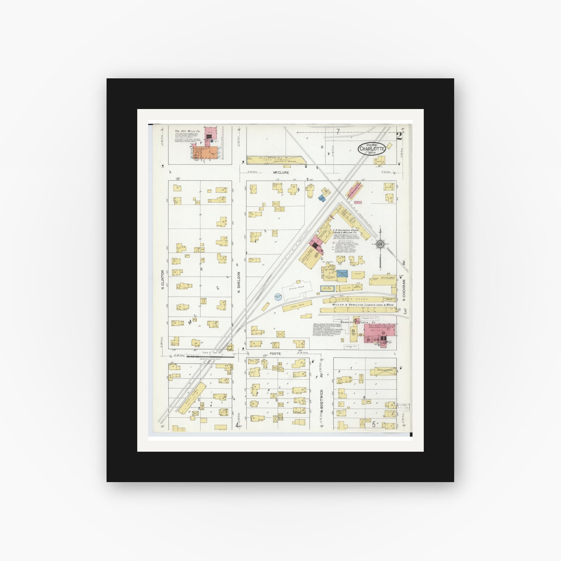 Old map wall art mockup — black gallery frame with white mat — Sanborn Fire Insurance Map from Charlotte, Eaton County, Michigan (1918), Sheet #0002