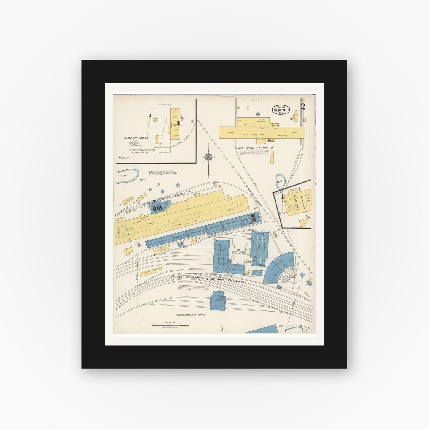 Old map wall art mockup — black gallery frame with white mat — Sanborn Fire Insurance Map from Bedford, Lawrence County, Indiana (1922), Sheet #0002