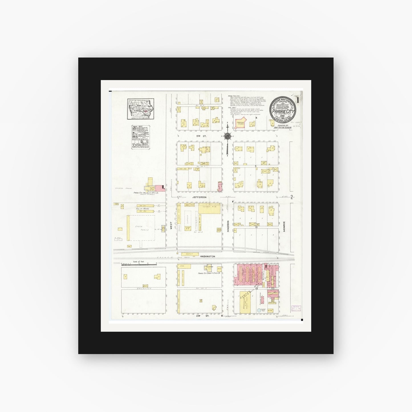 Old map wall art mockup — black gallery frame with white mat — Sanborn Fire Insurance Map from Prairie City, Jasper County, Iowa (1916), Sheet #0001