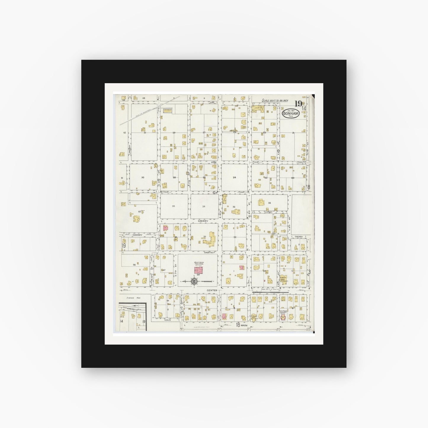 Old map wall art mockup — black gallery frame with white mat — Sanborn Fire Insurance Map from Bonham, Fannin County, Texas (1917), Sheet #0019