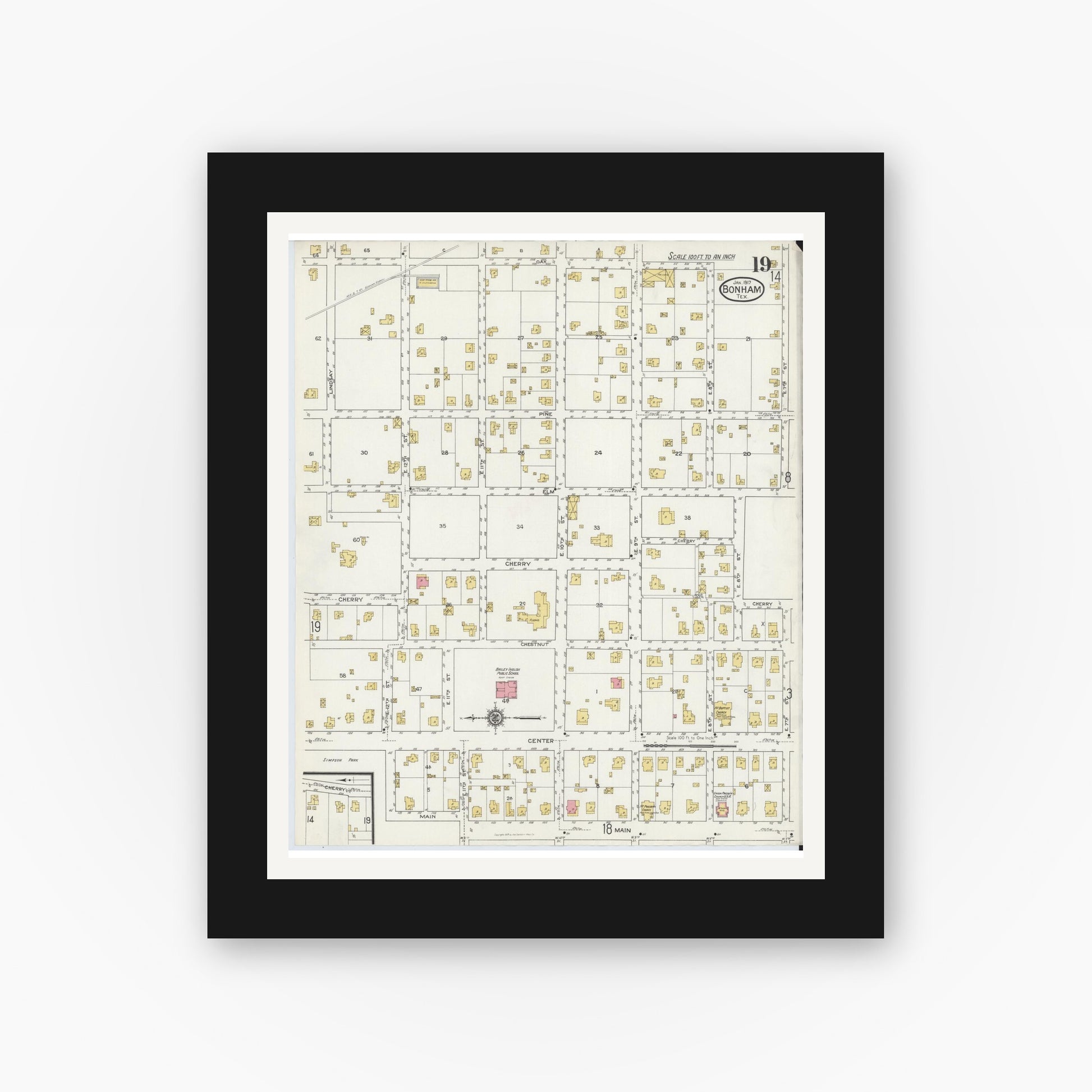Old map wall art mockup — black gallery frame with white mat — Sanborn Fire Insurance Map from Bonham, Fannin County, Texas (1917), Sheet #0019