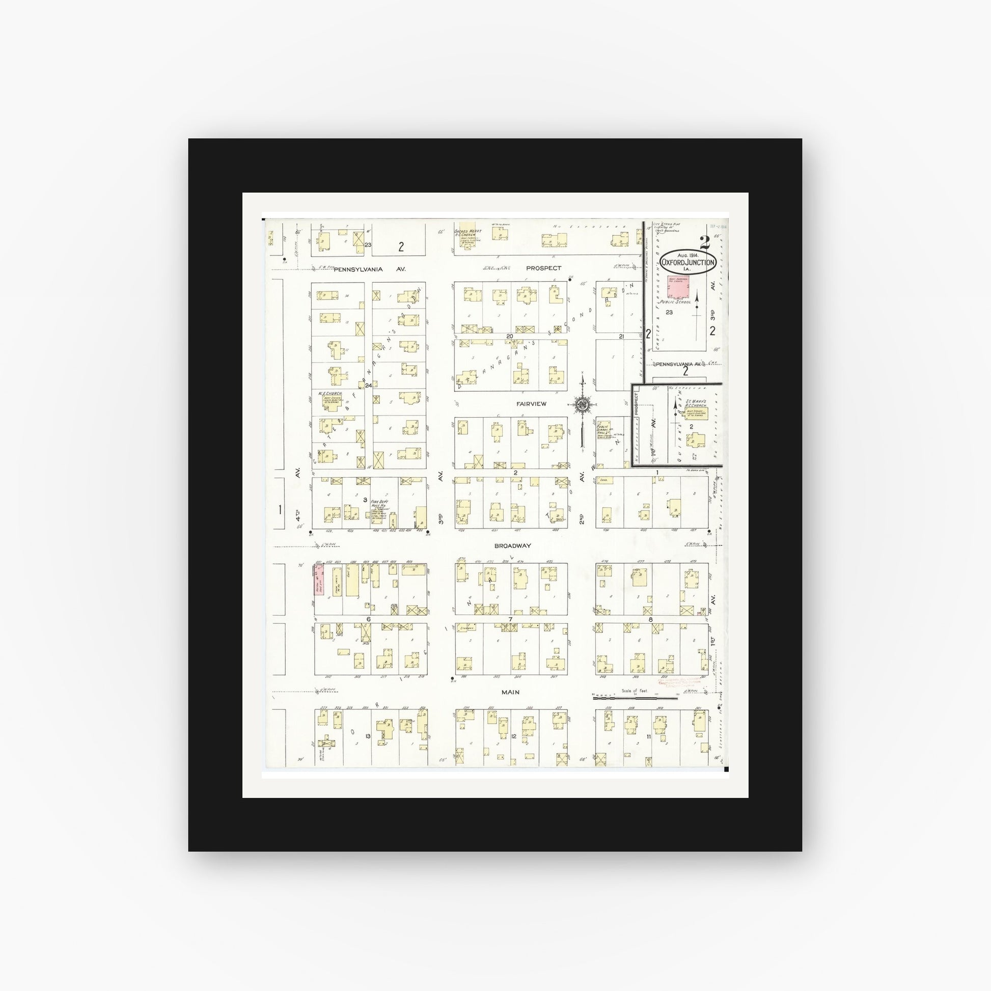Old map wall art mockup — black gallery frame with white mat — Sanborn Fire Insurance Map from Oxford Junction, Jones County, Iowa (1914), Sheet #0002