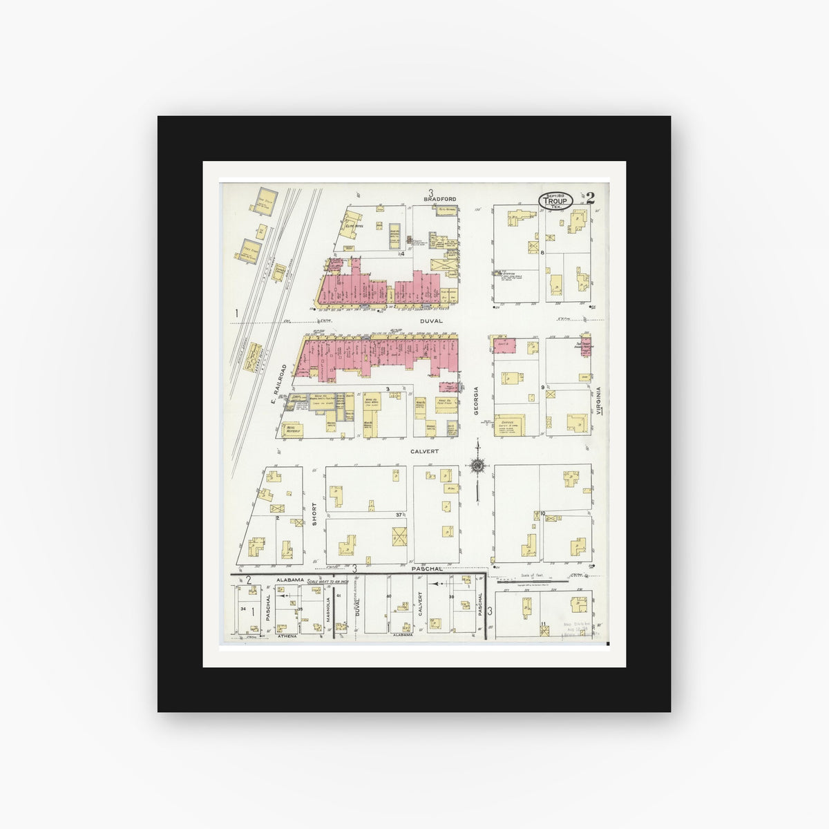 Old map wall art mockup — black gallery frame with white mat — Sanborn Fire Insurance Map from Troup, Smith County, Texas (1919), Sheet #0002