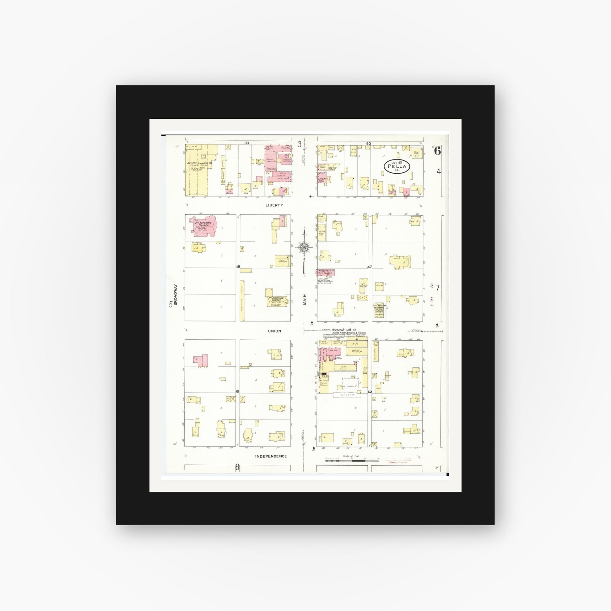 Old map wall art mockup — black gallery frame with white mat — Sanborn Fire Insurance Map from Pella, Marion County, Iowa (1911), Sheet #0006