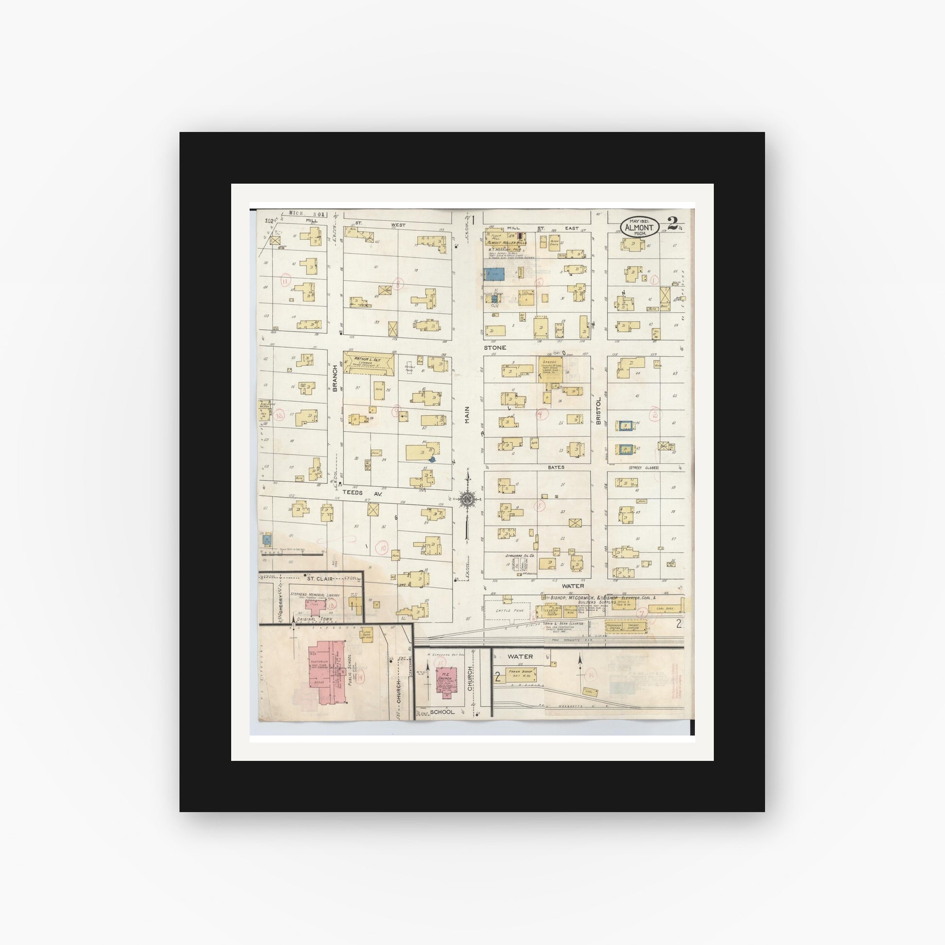 Old map wall art mockup — black gallery frame with white mat — Sanborn Fire Insurance Map from Almont, Lapeer County, Michigan (1929), Sheet #0002