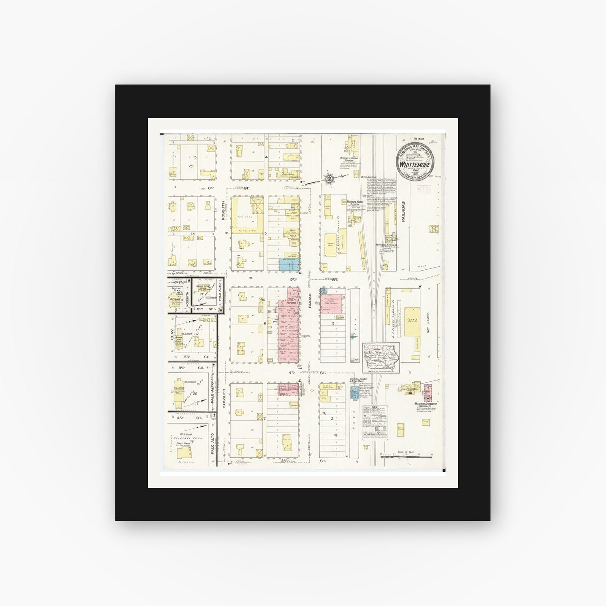 Old map wall art mockup — black gallery frame with white mat — Sanborn Fire Insurance Map from Whittemore, Kossuth County, Iowa (1915), Sheet #0001