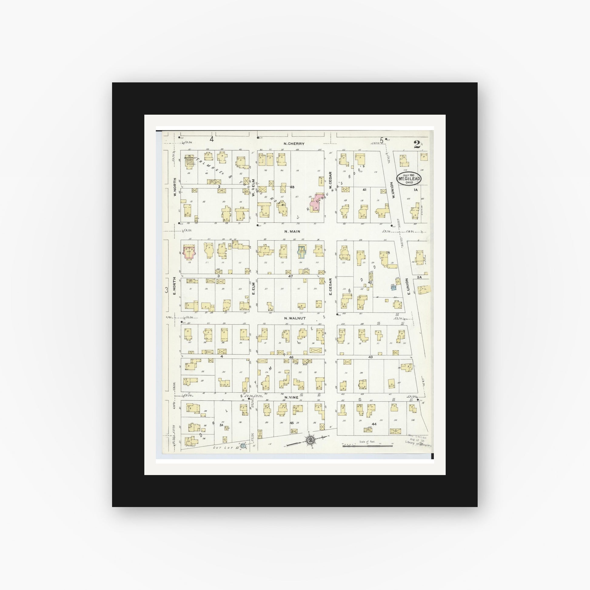 Old map wall art mockup — black gallery frame with white mat — Sanborn Fire Insurance Map from Mount Gilead, Morrow County, Ohio (1910), Sheet #0002