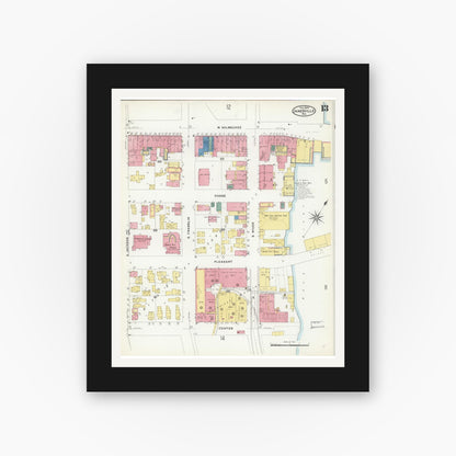 Old map wall art mockup — black gallery frame with white mat — Sanborn Fire Insurance Map from Janesville, Rock County, Wisconsin (1909), Sheet #0013