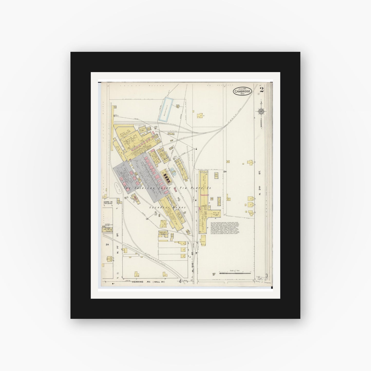 Old map wall art mockup — black gallery frame with white mat — Sanborn Fire Insurance Map from Cambridge, Guernsey County, Ohio (1915), Sheet #0002