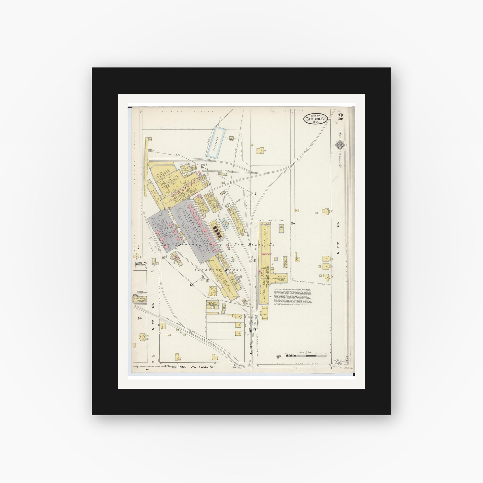 Old map wall art mockup — black gallery frame with white mat — Sanborn Fire Insurance Map from Cambridge, Guernsey County, Ohio (1915), Sheet #0002