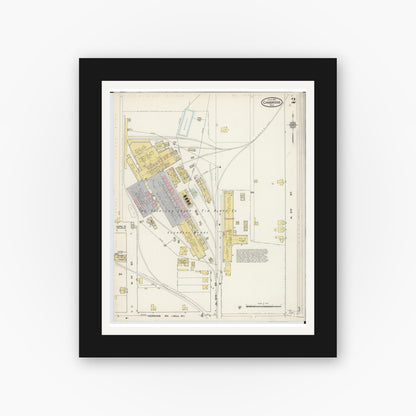 Old map wall art mockup — black gallery frame with white mat — Sanborn Fire Insurance Map from Cambridge, Guernsey County, Ohio (1915), Sheet #0002