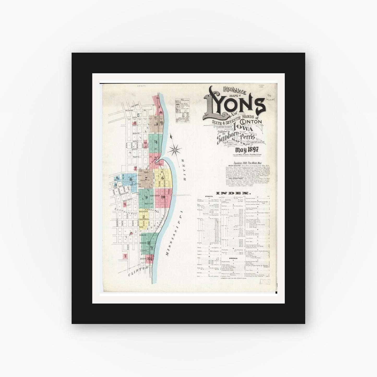 Old map wall art mockup — black gallery frame with white mat — Sanborn Fire Insurance Map from Lyons, Clinton County, Iowa (1897) â€” Complete Set