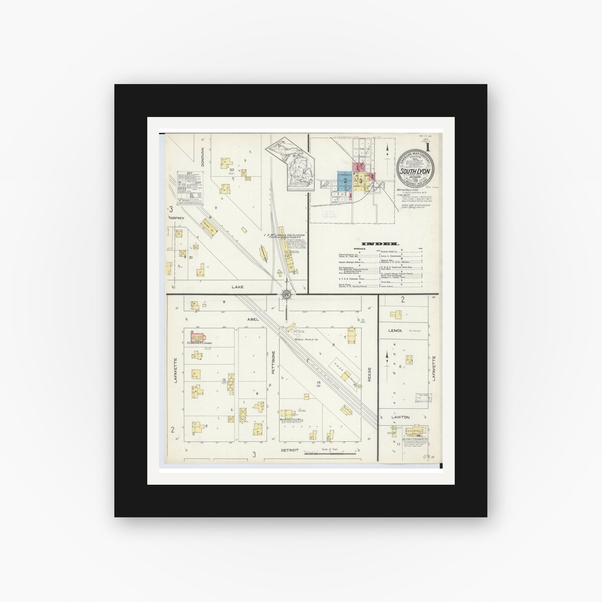 Old map wall art mockup — black gallery frame with white mat — Sanborn Fire Insurance Map from South Lyon, Oakland County, Michigan (1913) - Complete Map Set