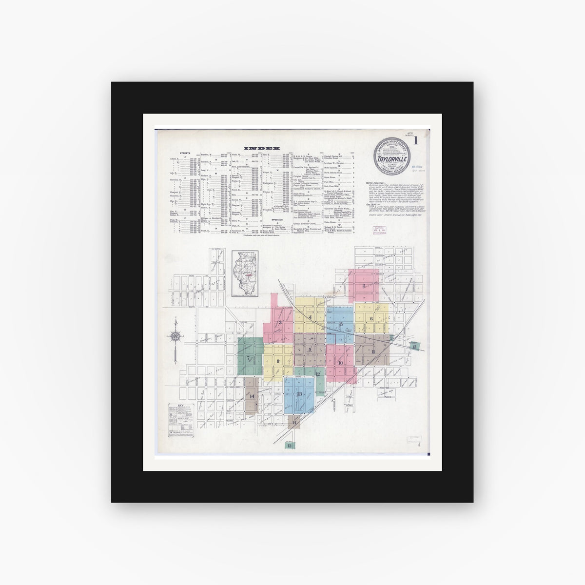 Old map wall art mockup — black gallery frame with white mat — Sanborn Fire Insurance Map from Taylorville, Christian County, Illinois (1914), Sheet #0001