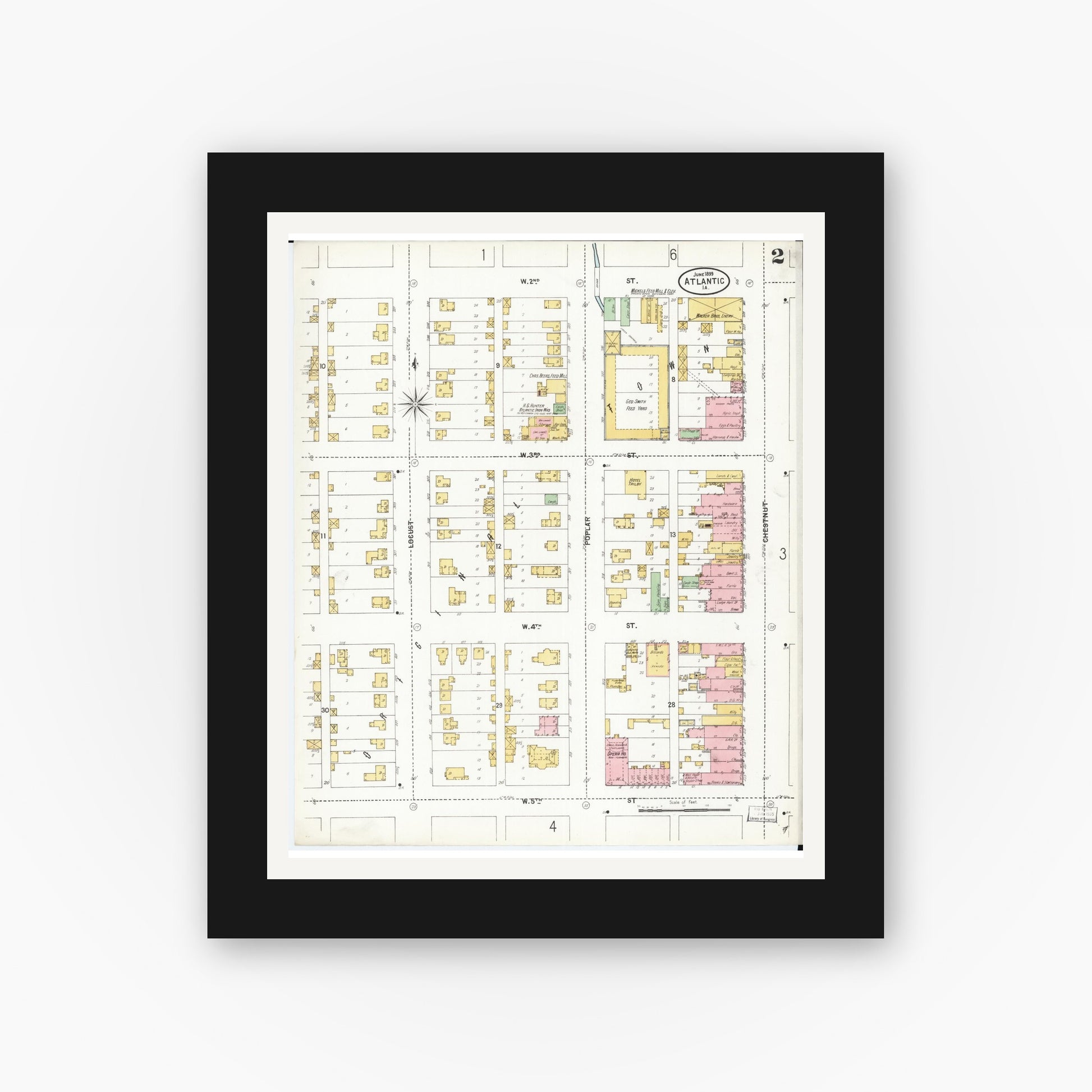 Old map wall art mockup — black gallery frame with white mat — Sanborn Fire Insurance Map from Atlantic, Cass County, Iowa (1899), Sheet #0002