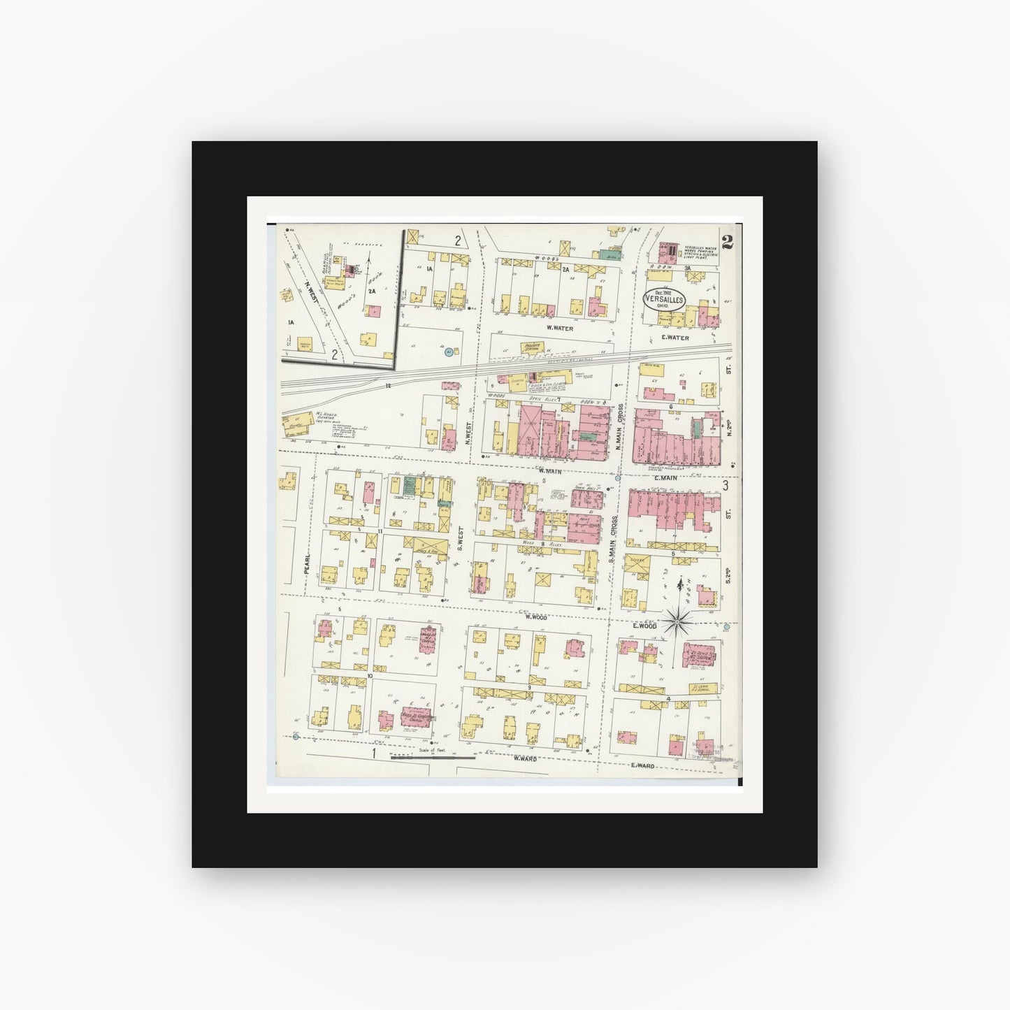 Old map wall art mockup — black gallery frame with white mat — Sanborn Fire Insurance Map from Versailles, Darke County, Ohio (1902), Sheet #0002