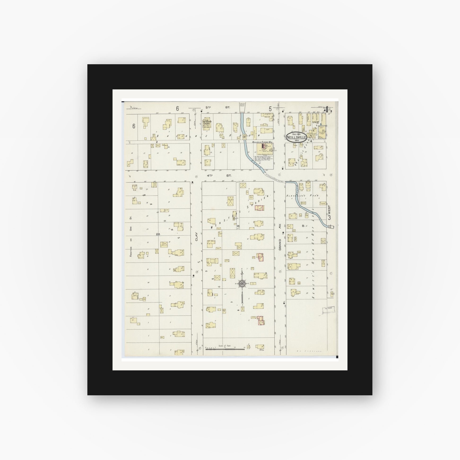 Old map wall art mockup — black gallery frame with white mat — Sanborn Fire Insurance Map from Neillsville, Clark County, Wisconsin (1914), Sheet #0004