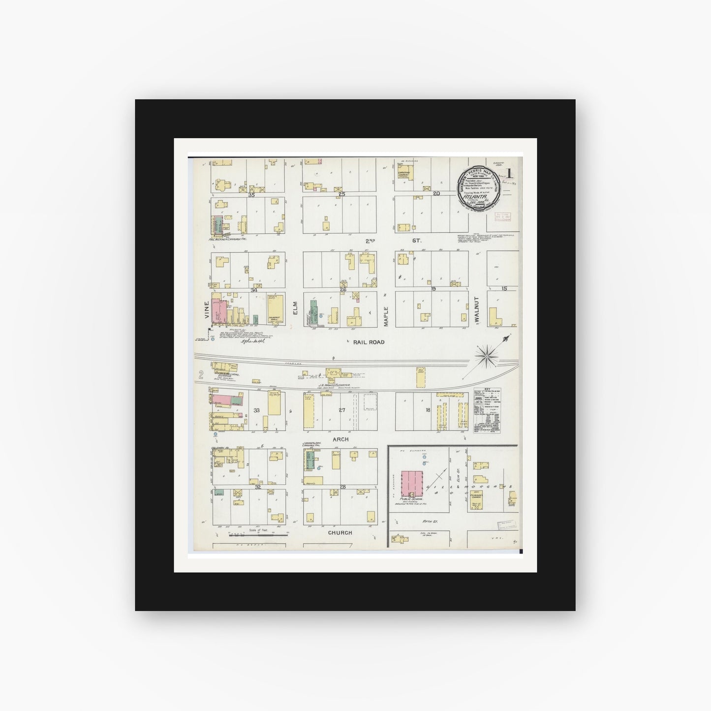 Old map wall art mockup — black gallery frame with white mat — Sanborn Fire Insurance Map from Atlanta, Logan County, Illinois (1892), Sheet #0001