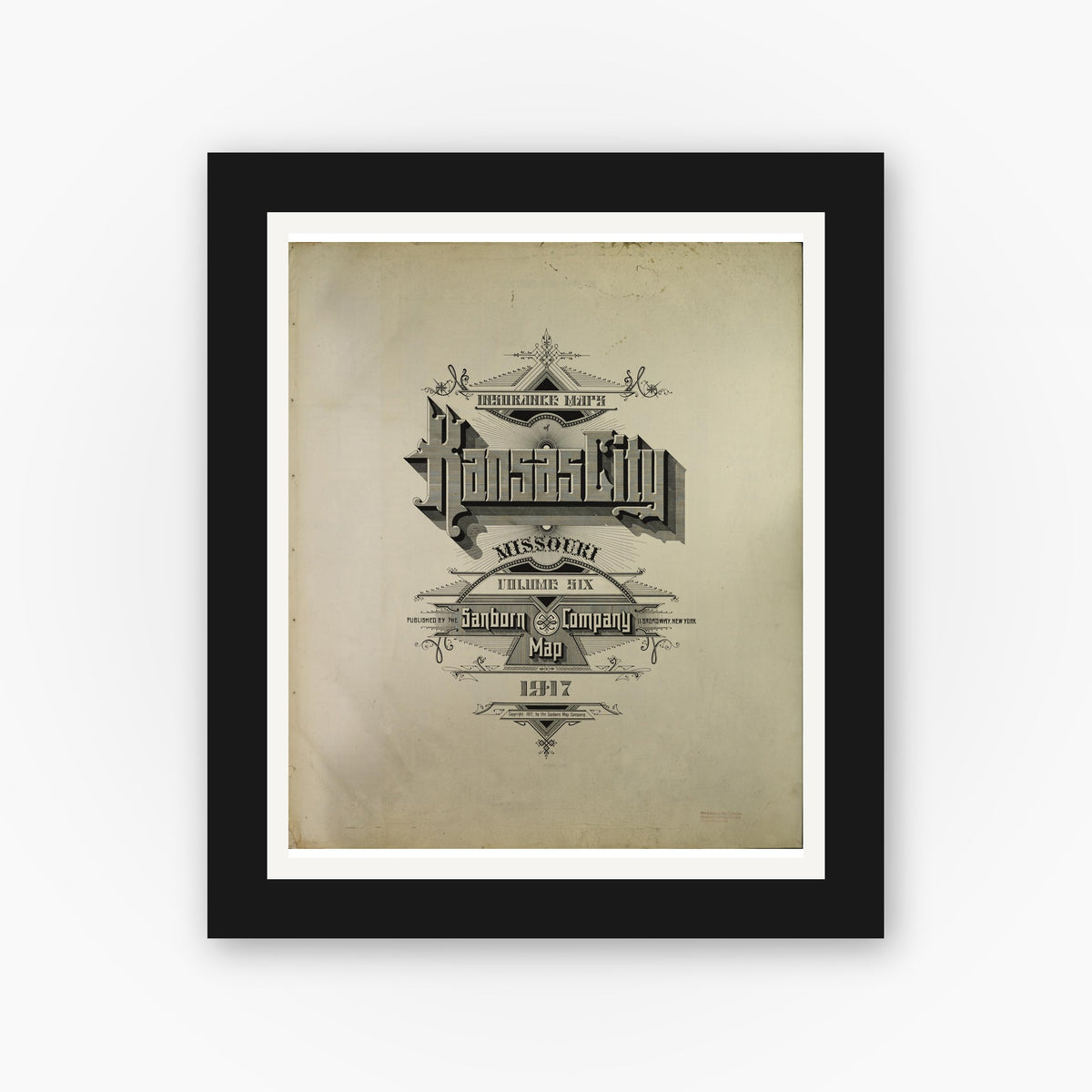 Old map wall art mockup — black gallery frame with white mat — Sanborn Fire Insurance Map from Kansas City, Jackson, Clay, And Platte Counties, Missouri (1917), Sheet #0001