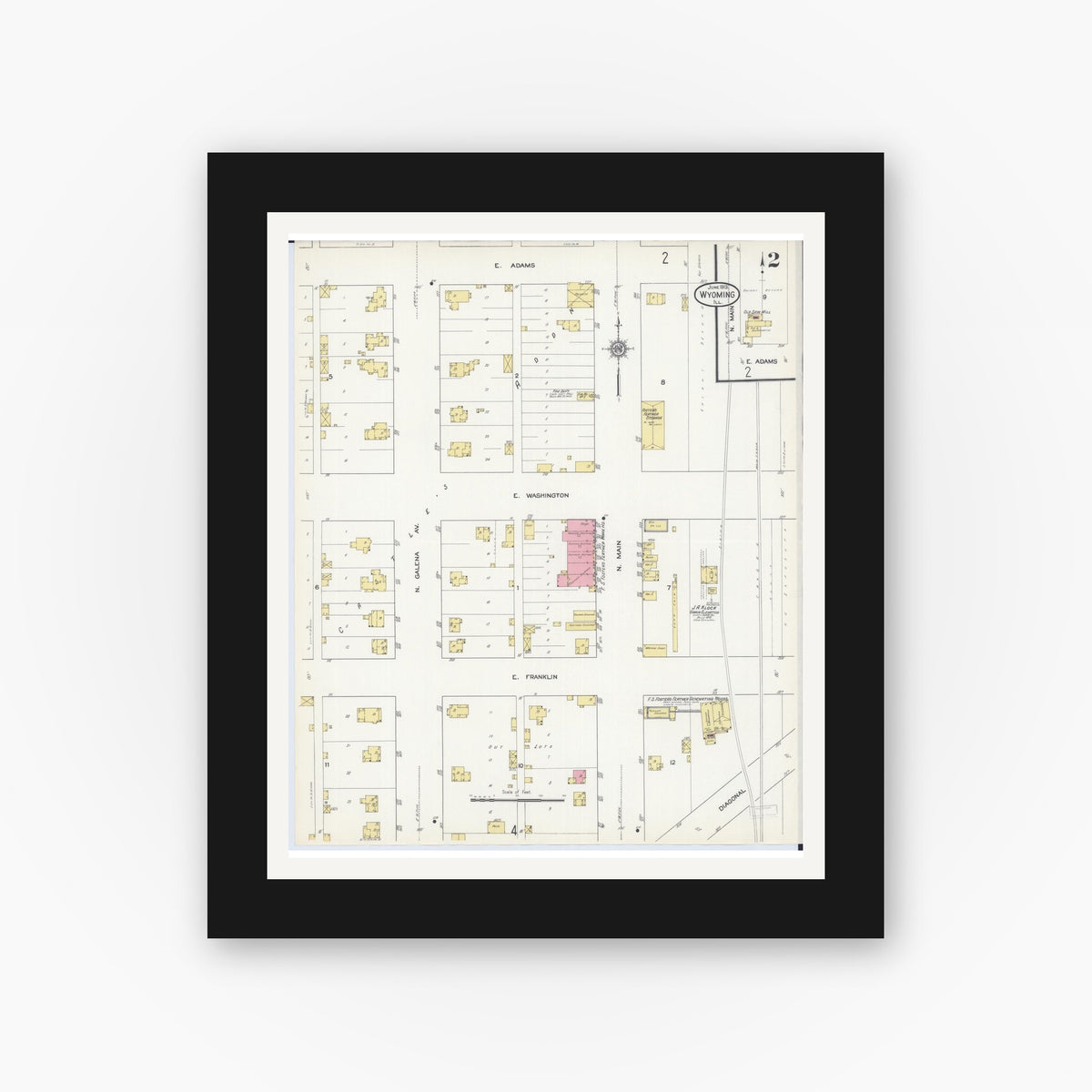 Old map wall art mockup — black gallery frame with white mat — Sanborn Fire Insurance Map from Wyoming, Stark County, Illinois (1913), Sheet #0002