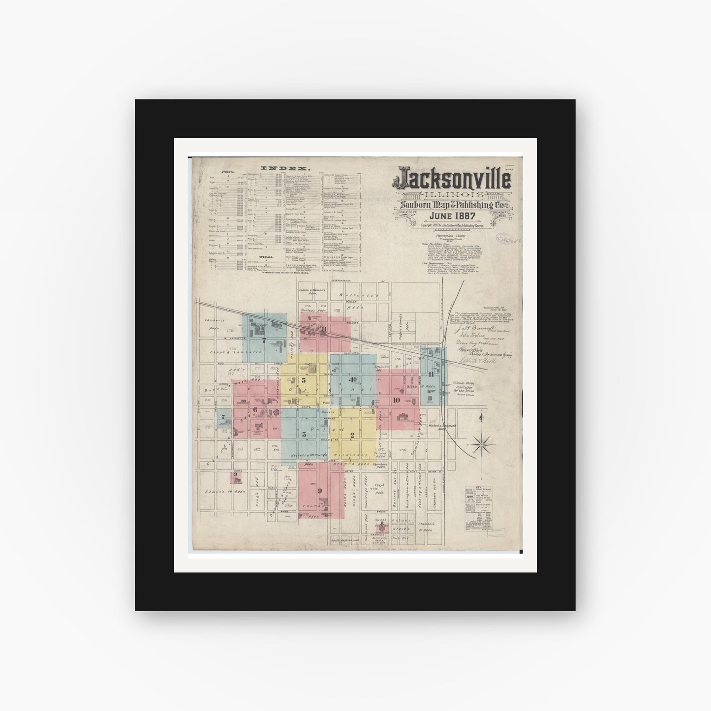 Old map wall art mockup — black gallery frame with white mat — Sanborn Fire Insurance Map from Jacksonville, Morgan County, Illinois (1887), Sheet #0001