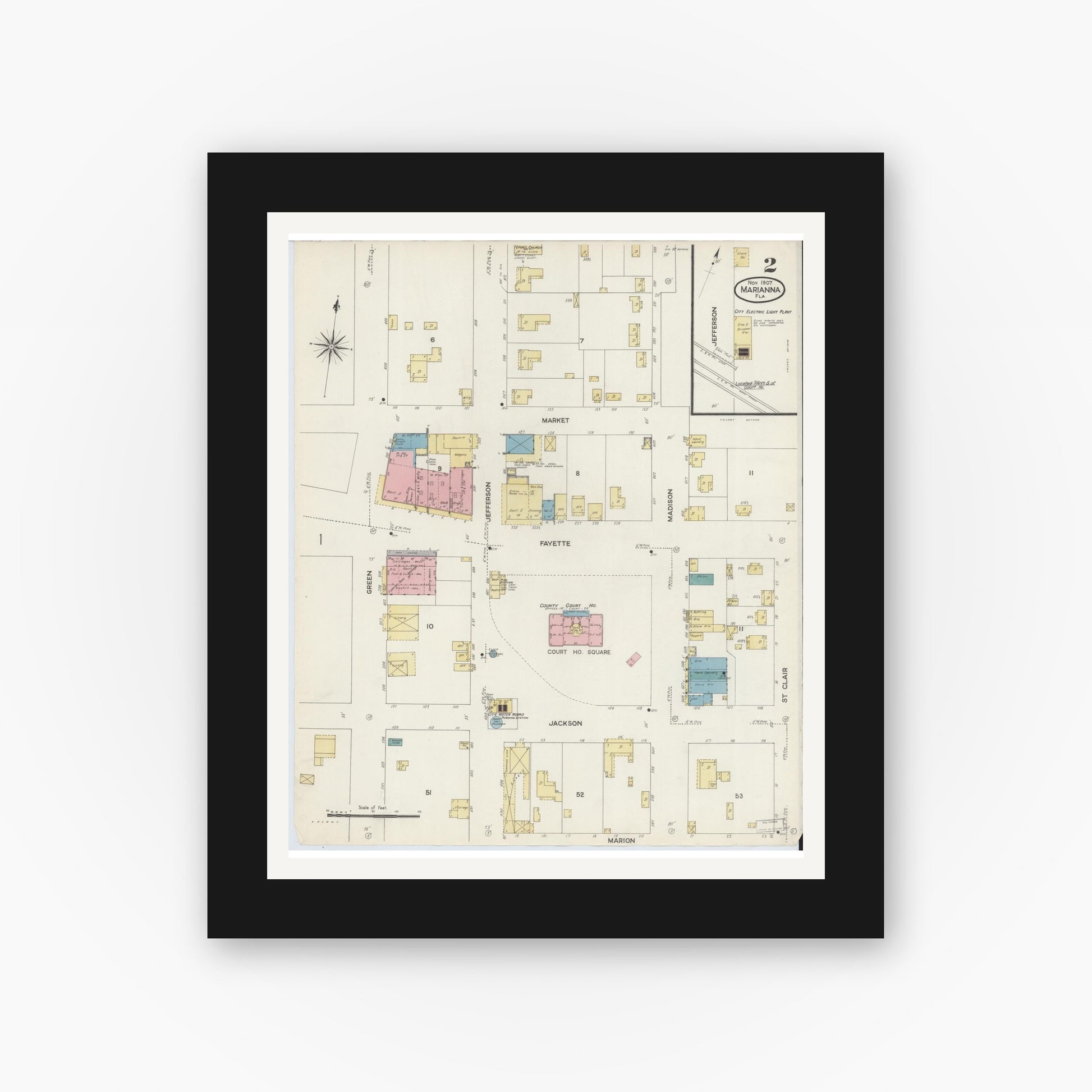 Old map wall art mockup — black gallery frame with white mat — Sanborn Fire Insurance Map from Marianna, Jackson County, Florida (1907), Sheet #0002