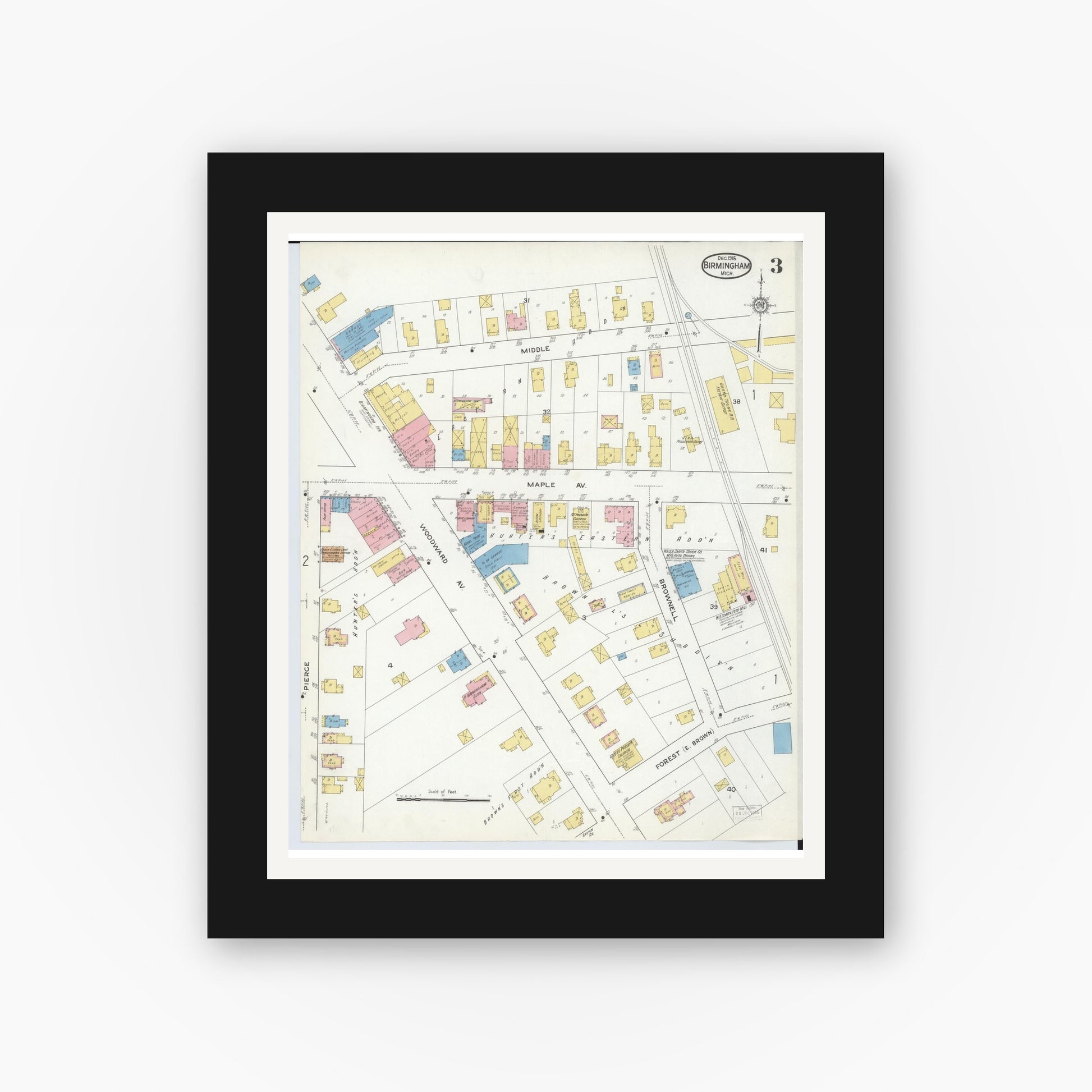 Old map wall art mockup — black gallery frame with white mat — Sanborn Fire Insurance Map from Birmingham, Oakland County, Michigan (1915), Sheet #0003